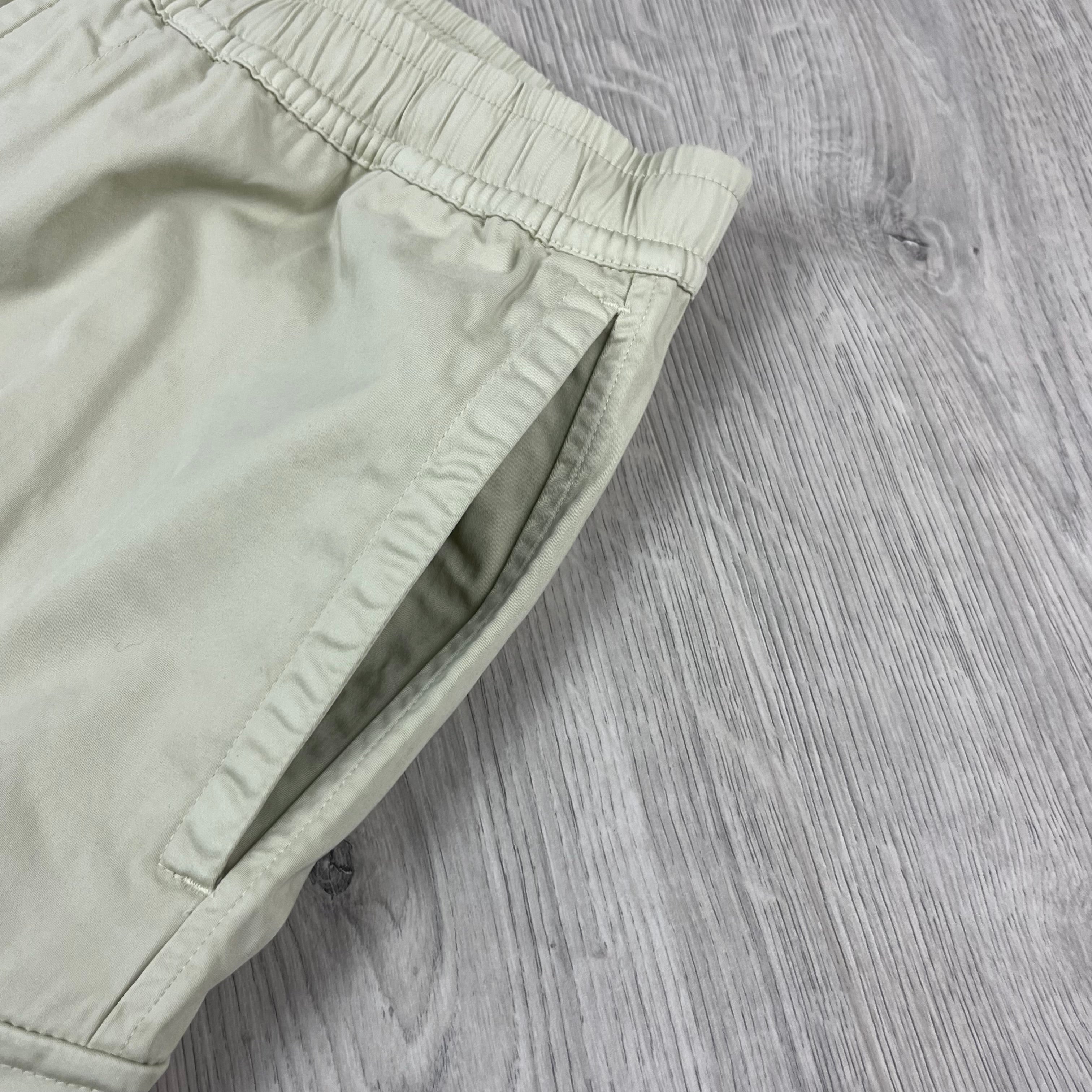 Men's Stone Island Cargo Shorts in Sand. On sale at Open Attire.