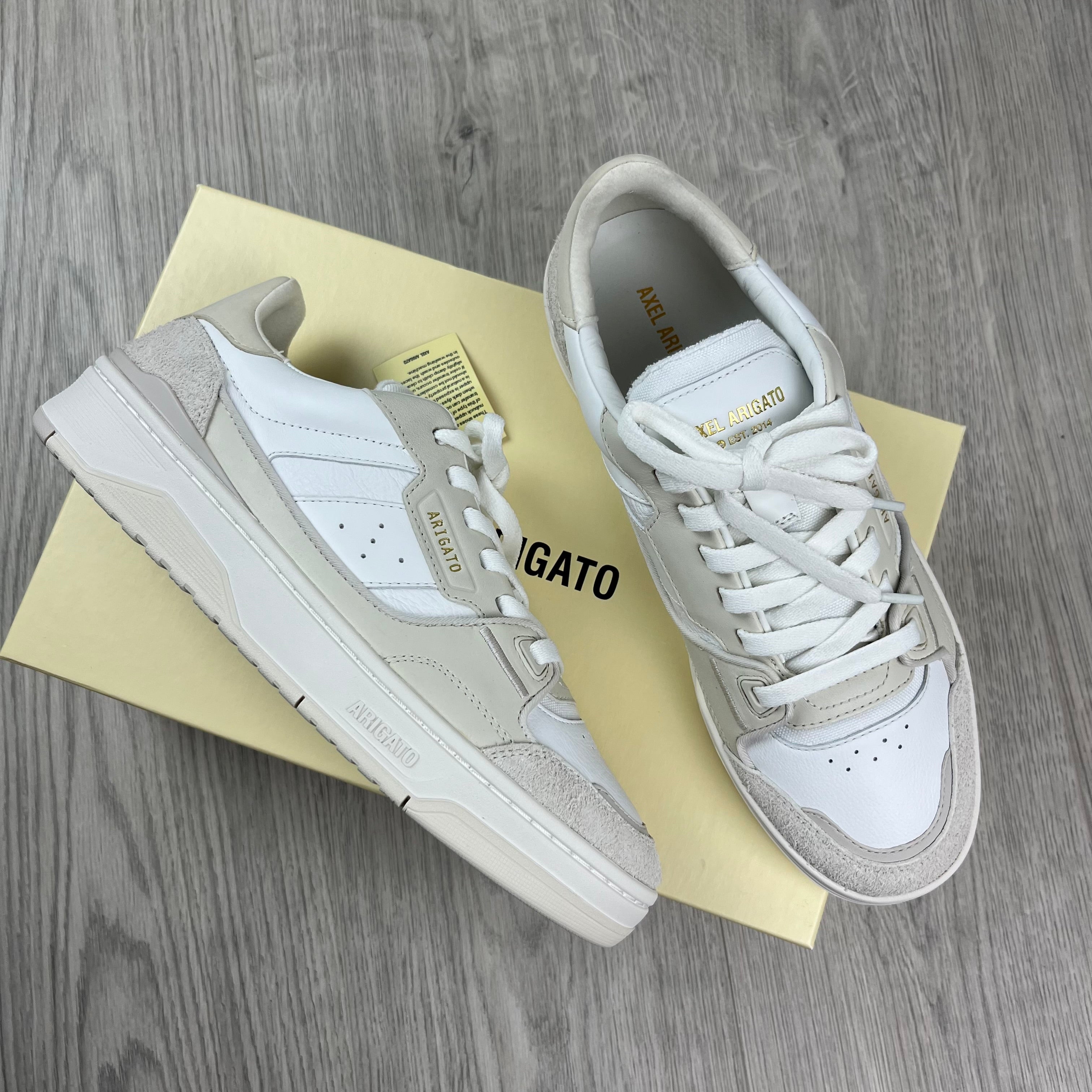 Men's Axel Arigato Clay Sneakers in Beige/White. On sale at Open Attire.