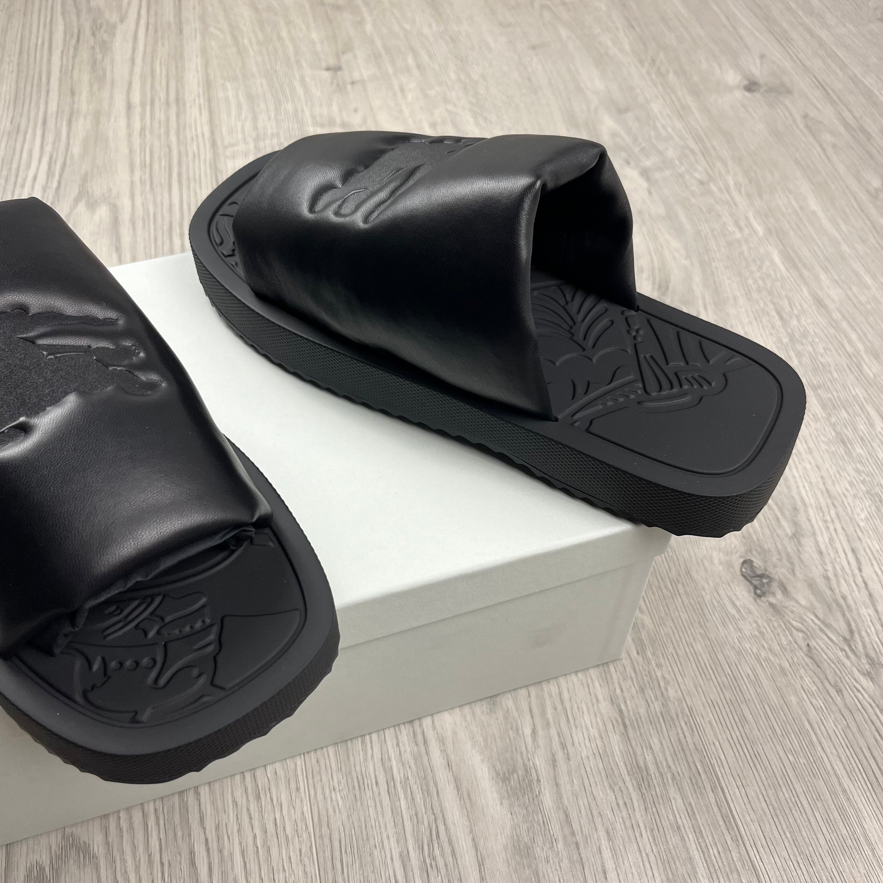 Burberry EKD Slab Slides in Black. On sale at Open Attire.