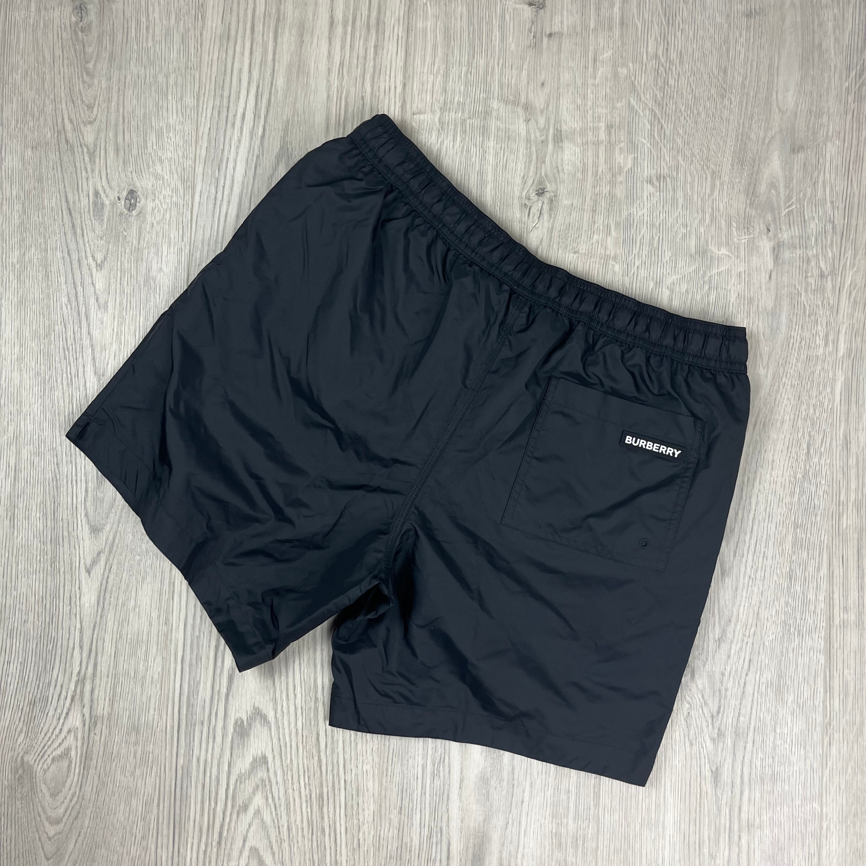 Burberry 'Martin' Swim Shorts in Black. On sale at Open Attire.