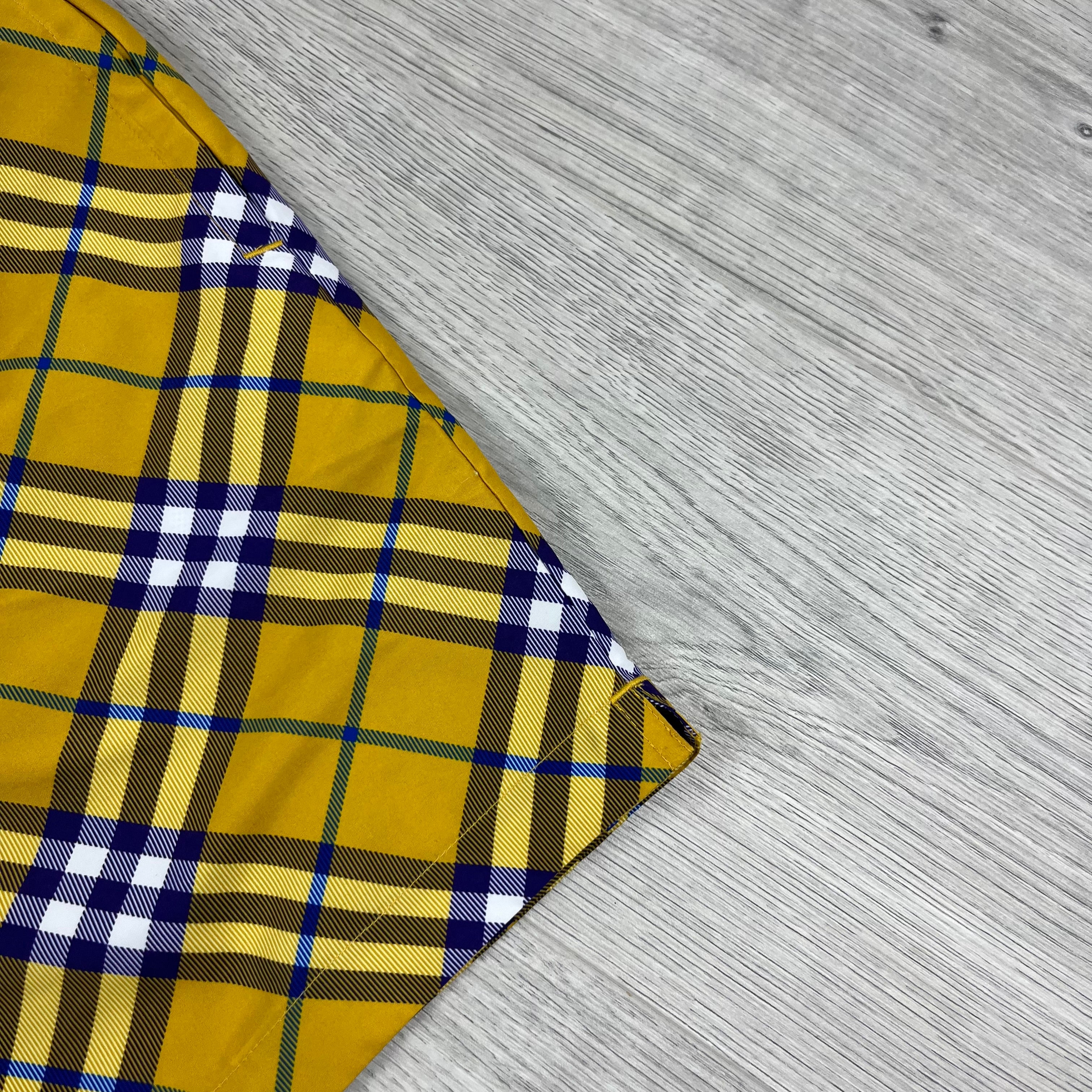 Burberry Vintage Check Swim Shorts in Yellow Pear. On sale at Open Attire.