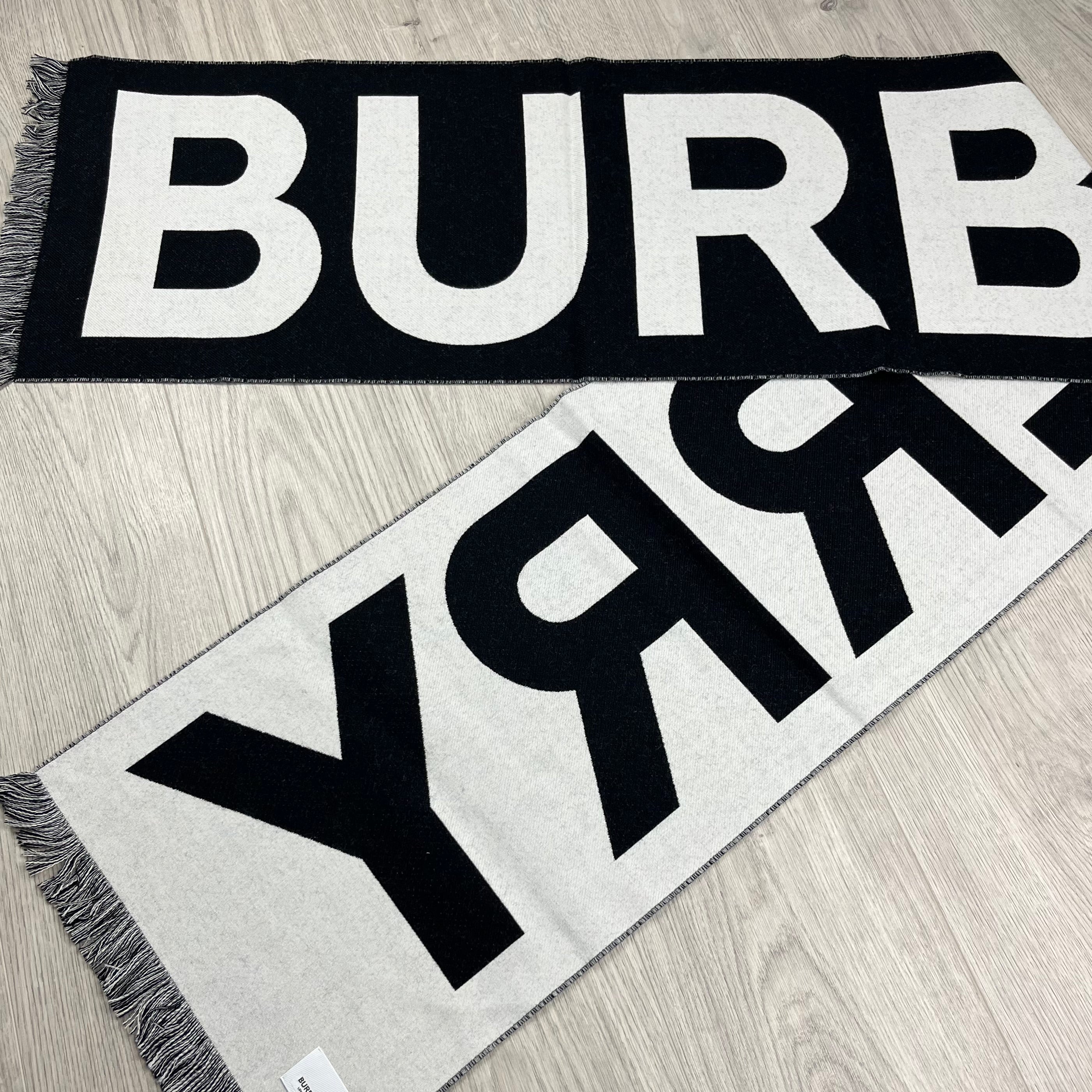 Burberry Wool Scarf in Black. On sale at Open Attire.