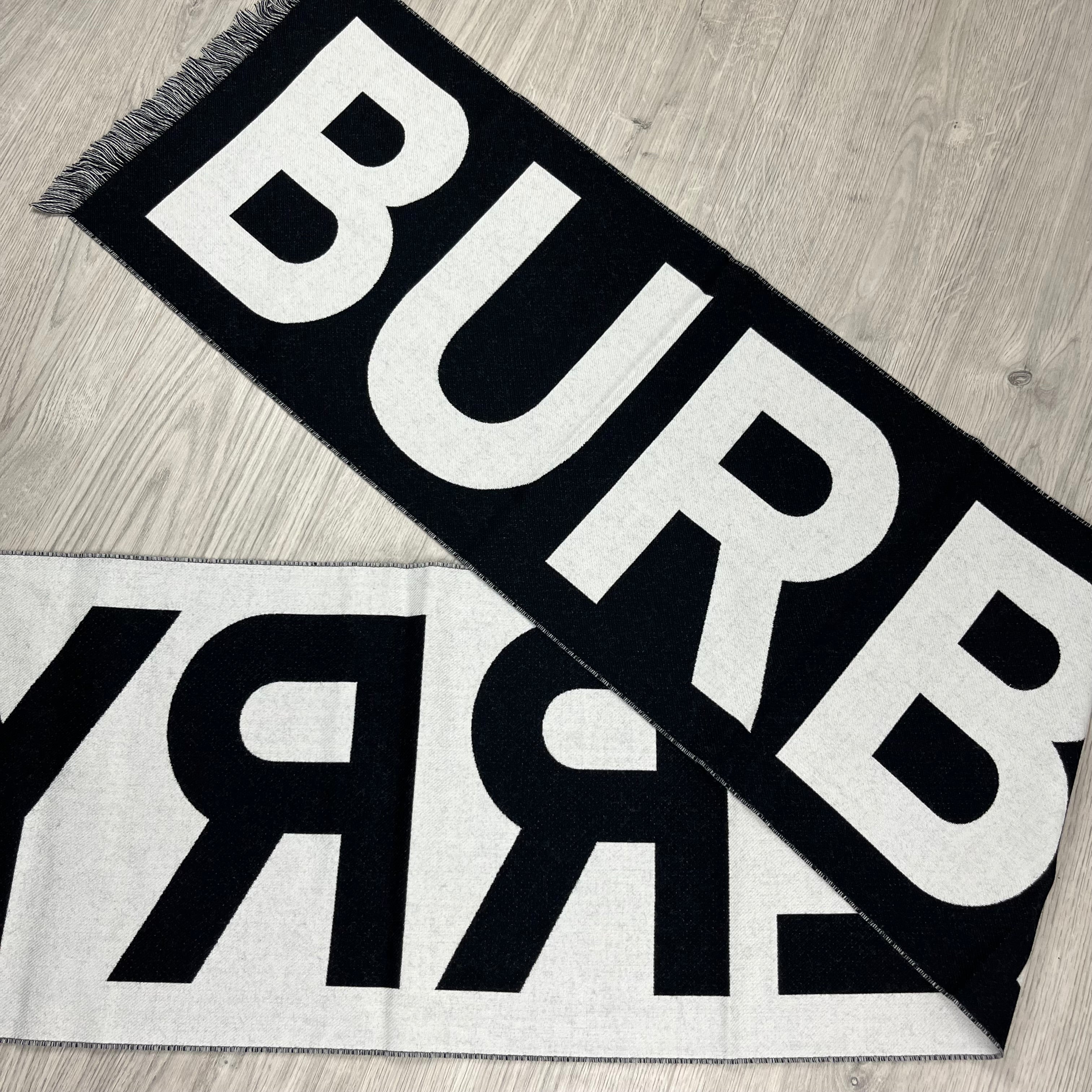 Burberry Wool Scarf in Black. On sale at Open Attire.
