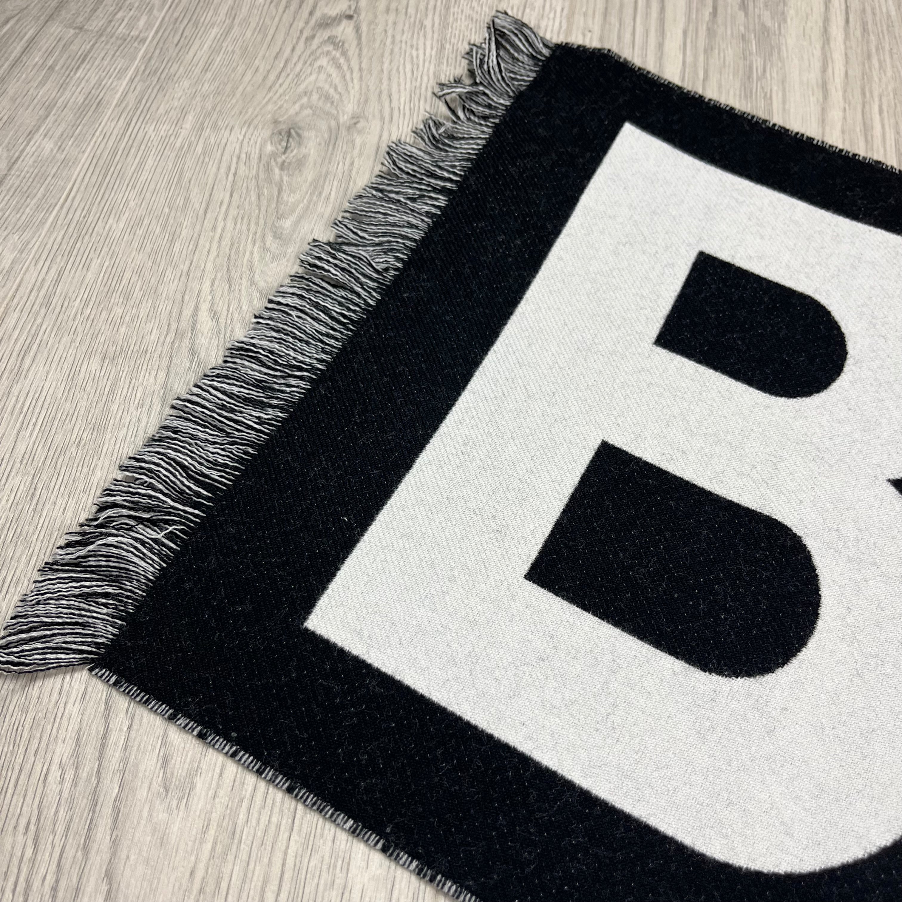 Burberry Wool Scarf in Black. On sale at Open Attire.