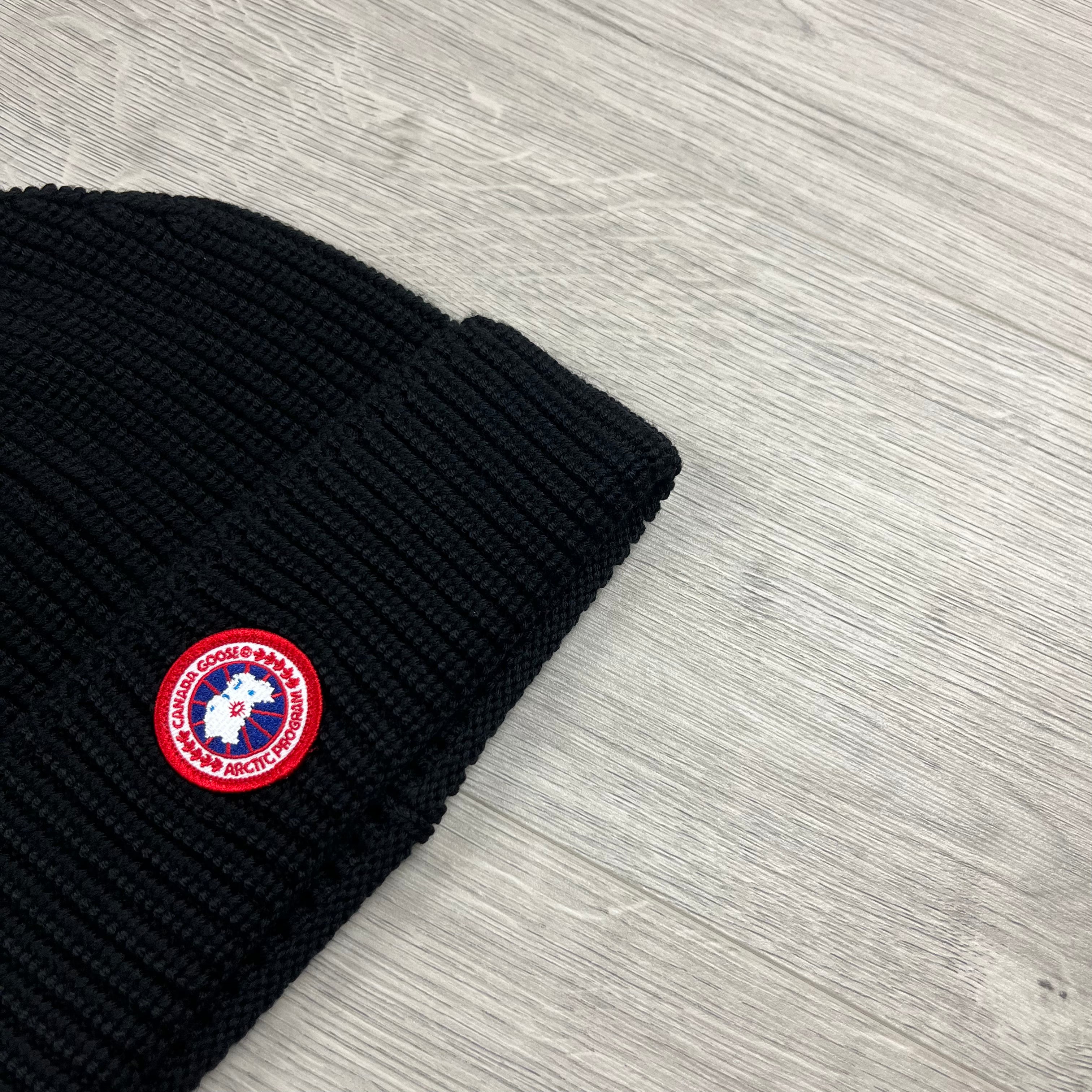 Canada Goose Ribbed Toque Beanie in Black. On sale at Open Attire.