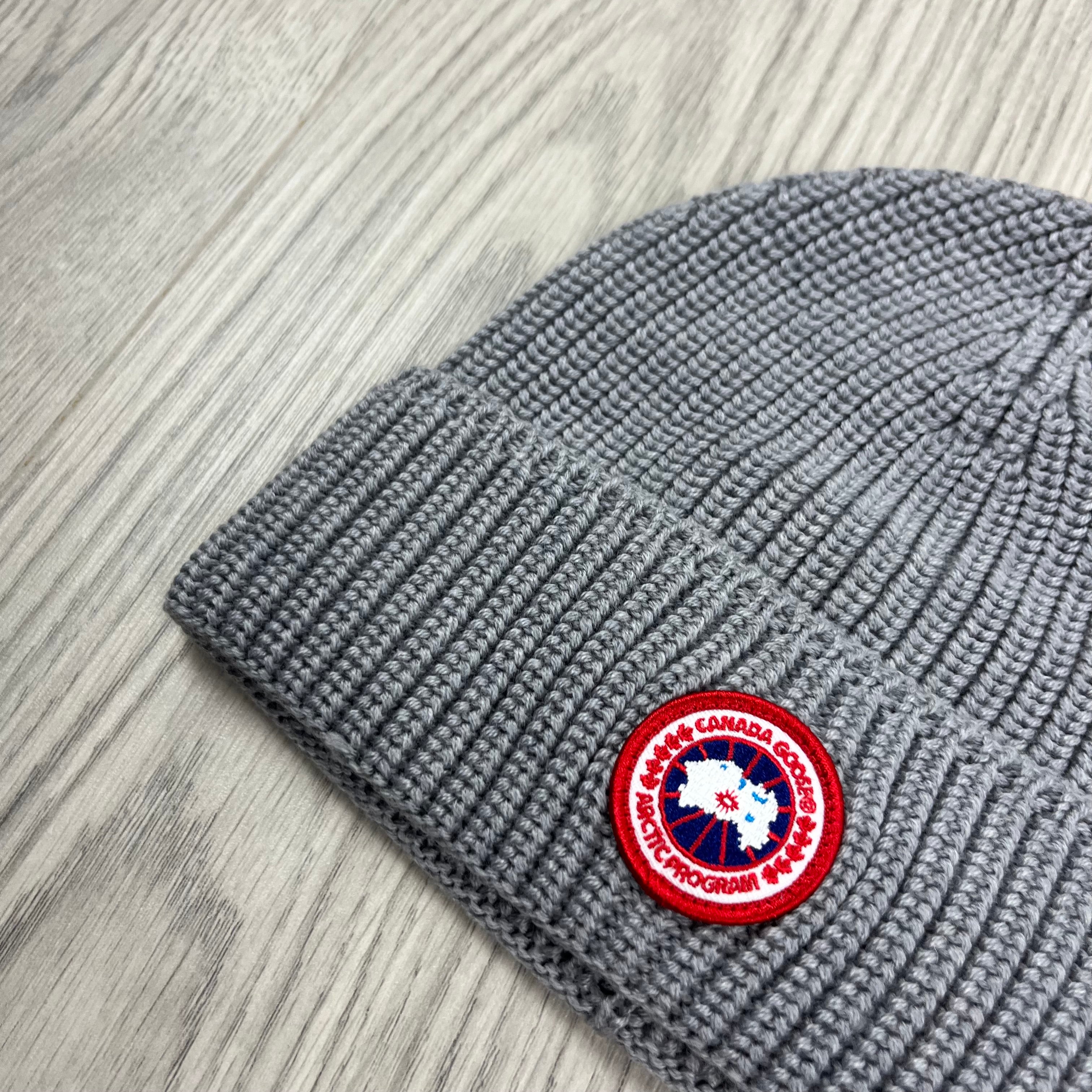 Men's Canada Goose Ribbed Beanie in Heather Grey. On sale at Open Attire.