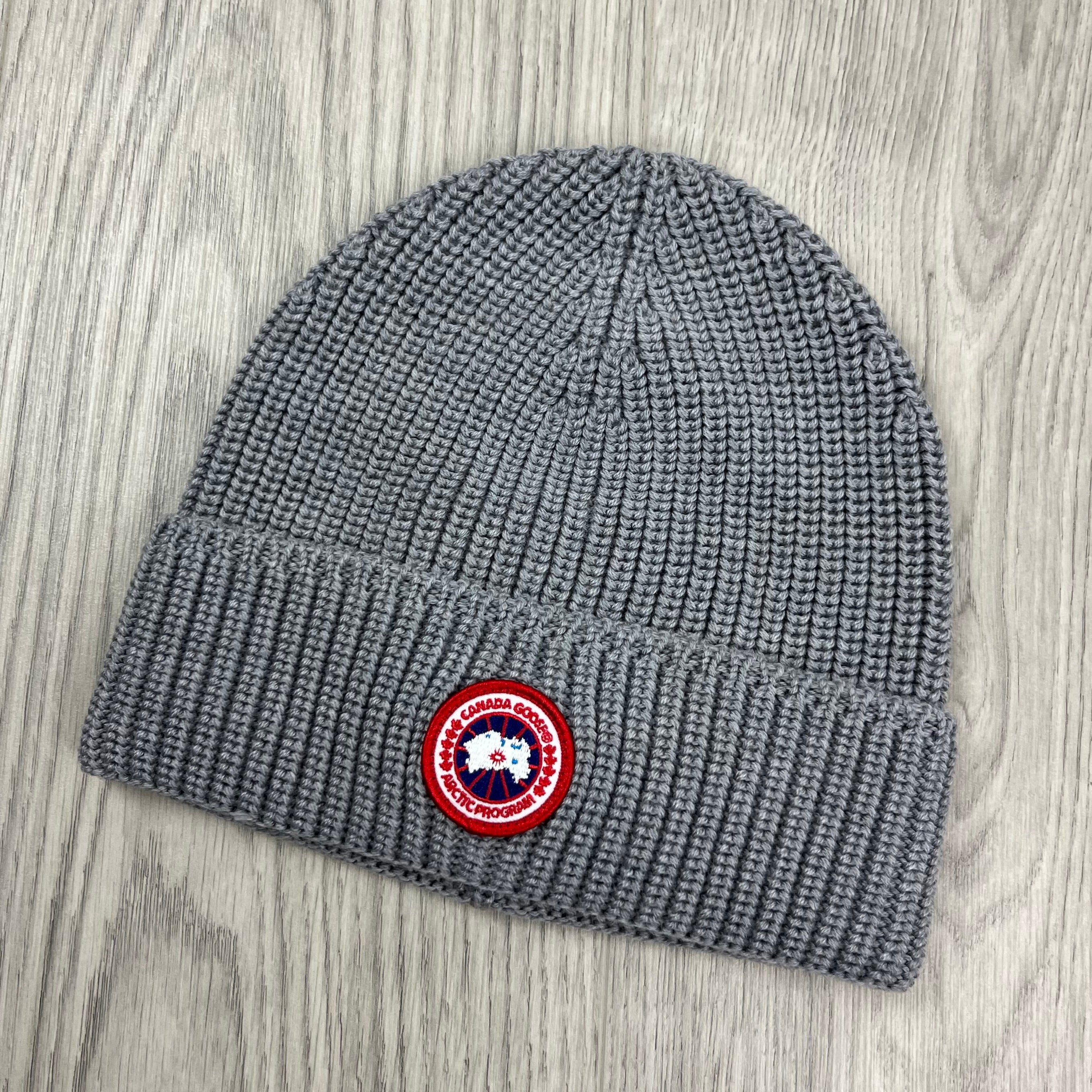 Men's Canada Goose Ribbed Beanie in Heather Grey. On sale at Open Attire.