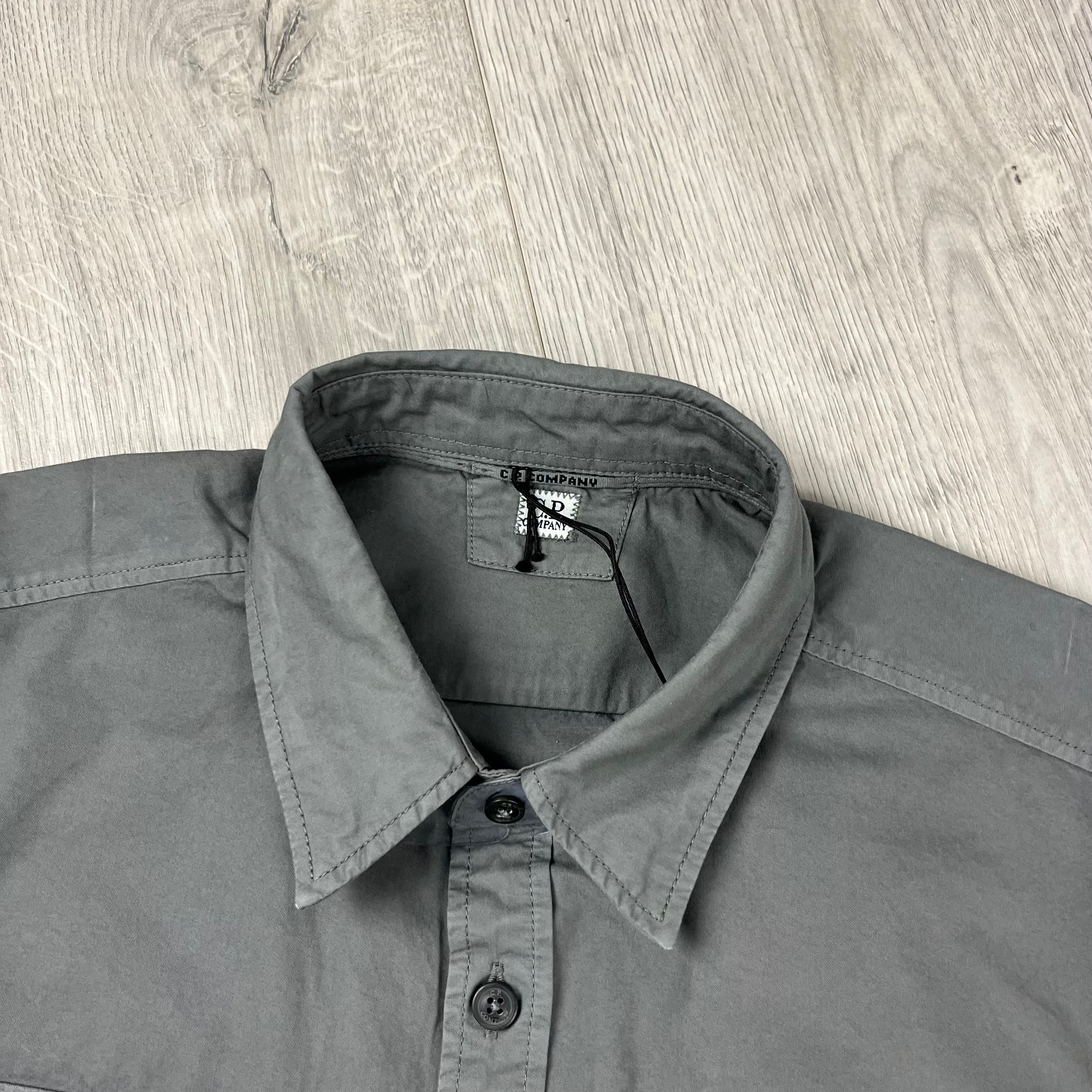 CP Company Button Gabardine Overshirt in Smoked Pearl. On sale at Open Attire.