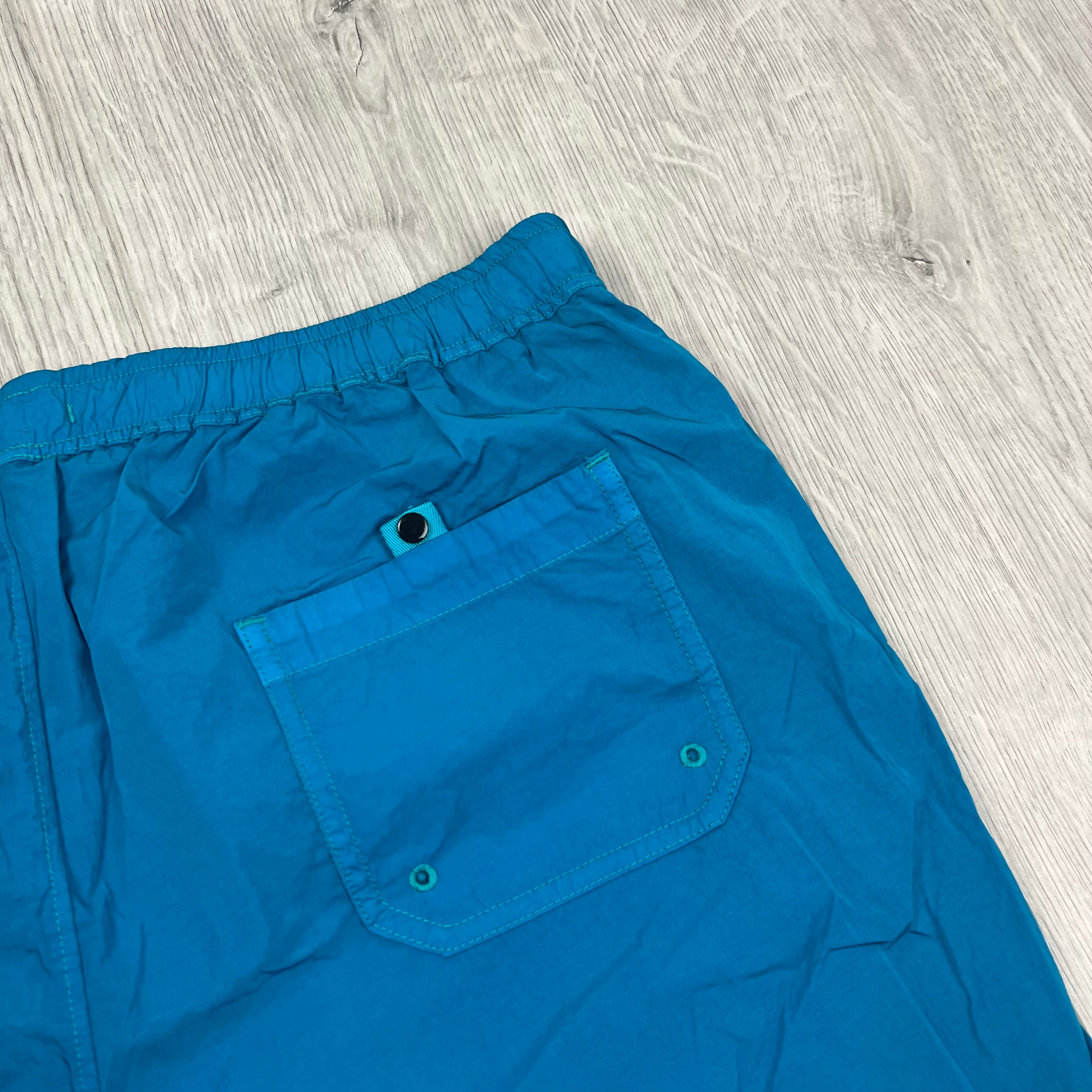 CP Company Chrome-R Swim Shorts in Tile Blue. On sale at Open Attire.