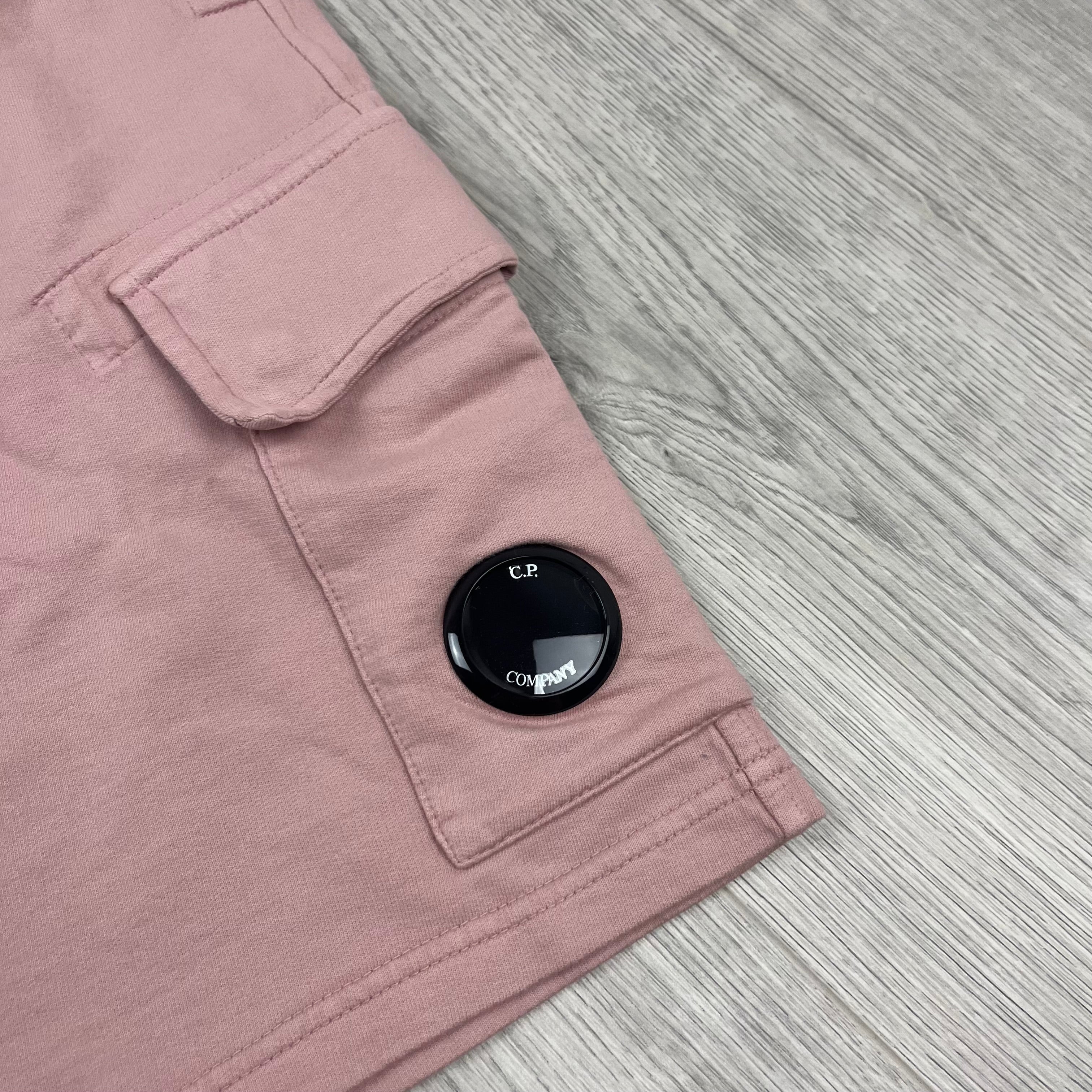 CP Company Light Fleece Jersey Shorts in Misty Rose. On sale at Open Attire.