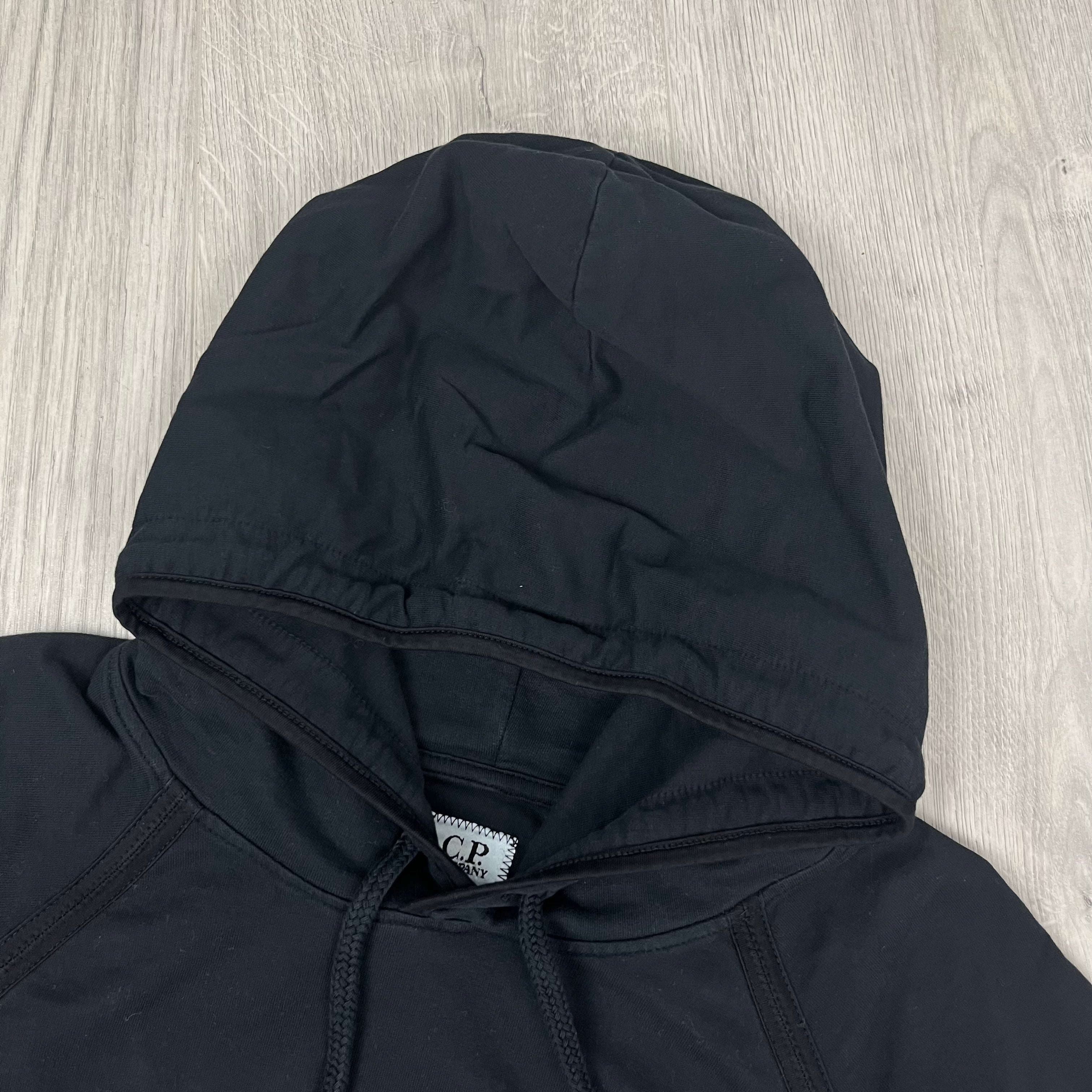 CP Company Light Fleece Hoodie in Black. On sale at Open Attire.