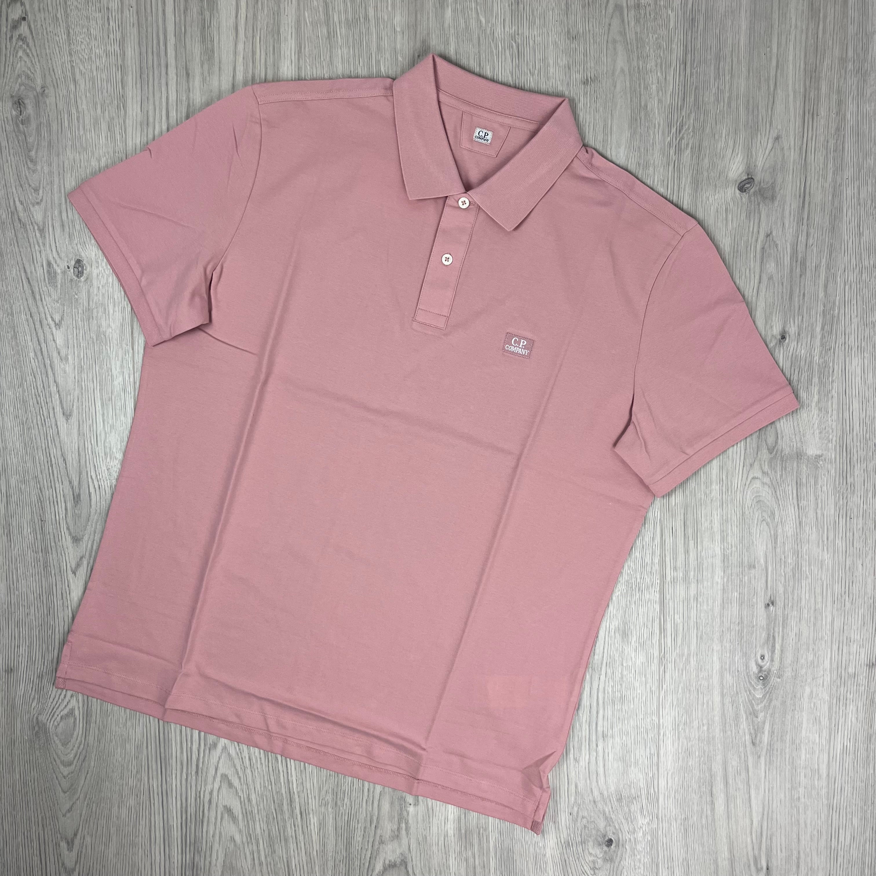 CP Company Piquet Polo Shirt in Misty Rose. On sale at Open Attire.