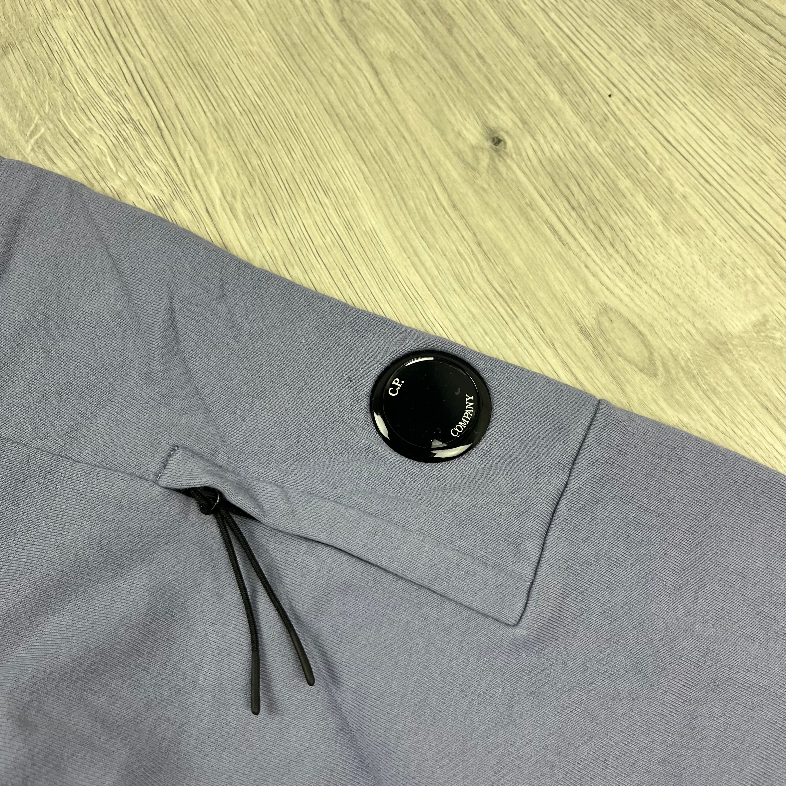 CP Company Diagonal Raised Fleece Hoodie in Lavender Violet. On sale at Open Attire.