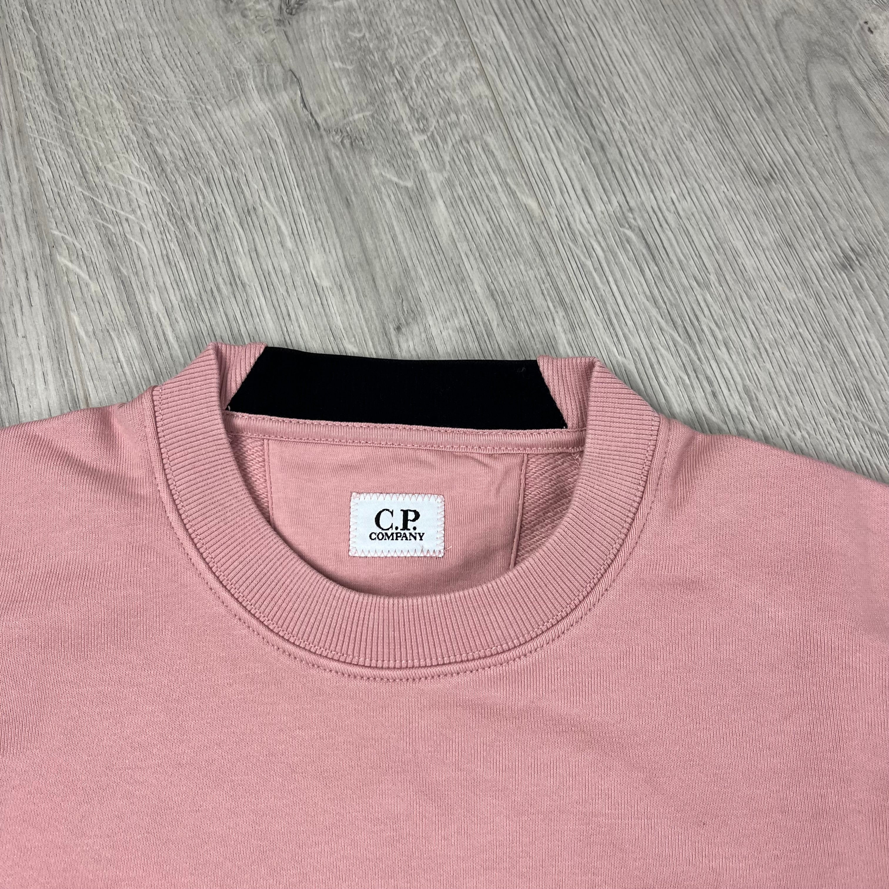 CP Company Raised Fleece Sweatshirt in Misty Rose. On sale at Open Attire.