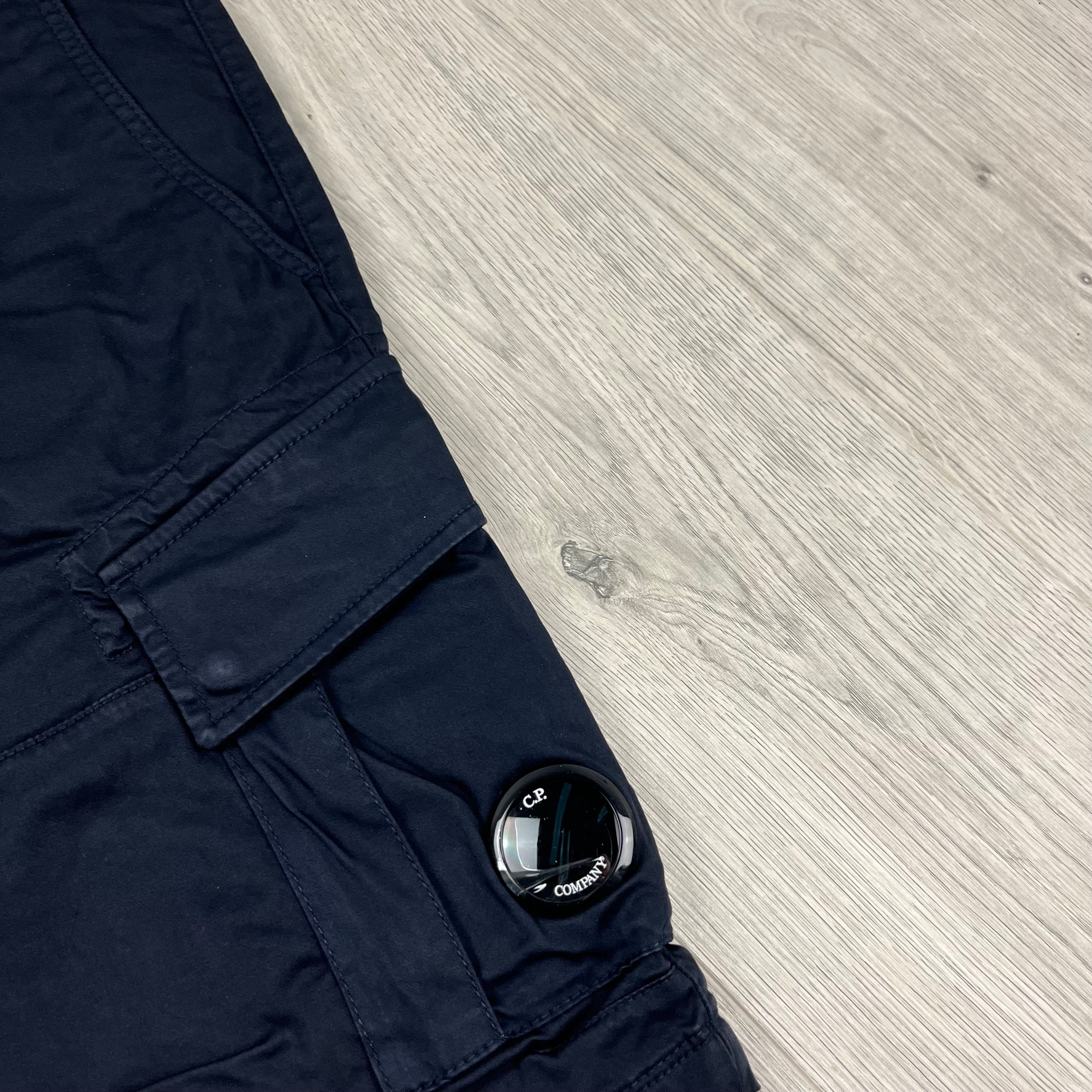 CP Company Stretch Sateen Cargo Shorts in Total Eclipse. On sale at Open Attire.