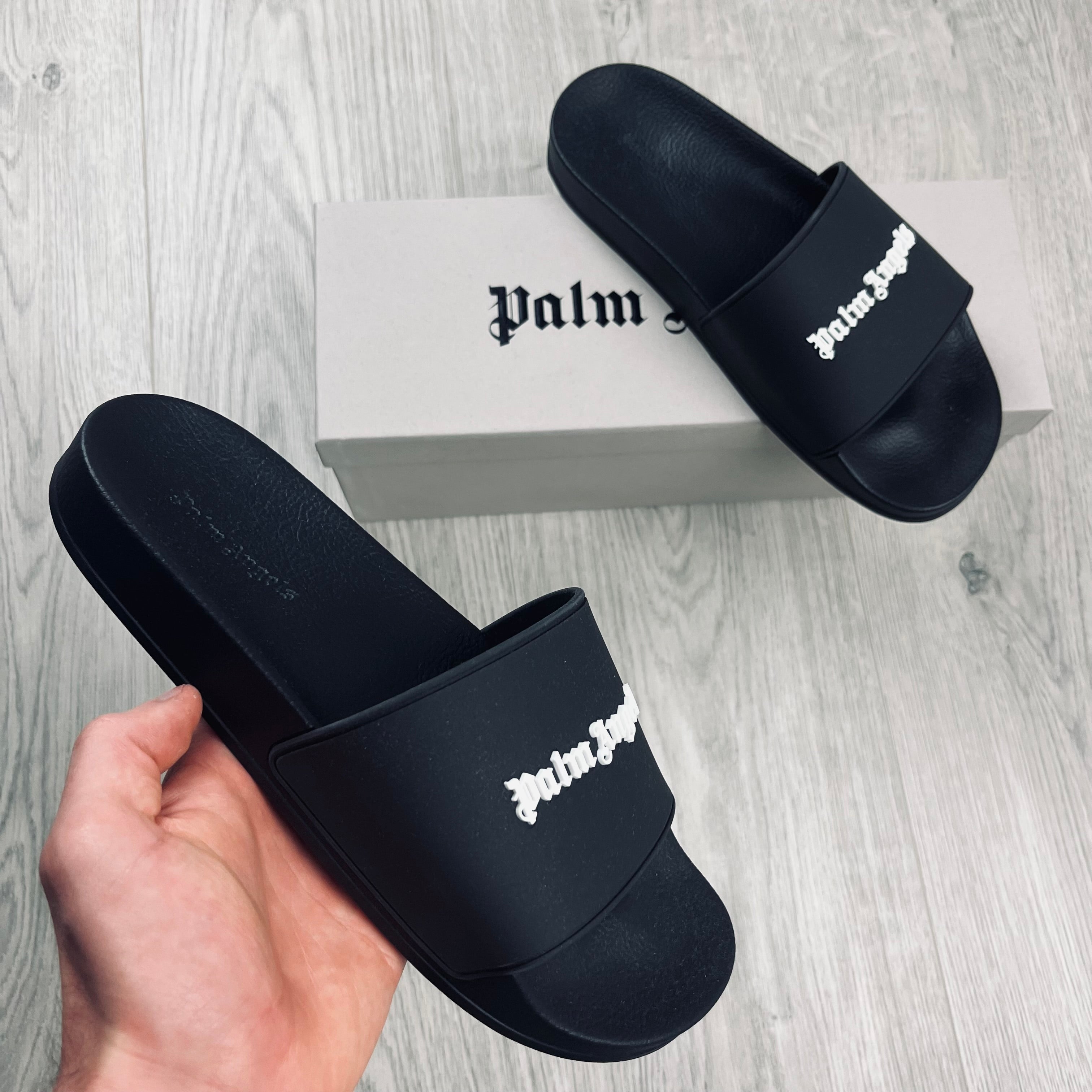 Palm Angels Rubber Slides in Black. On sale at Open Attire.