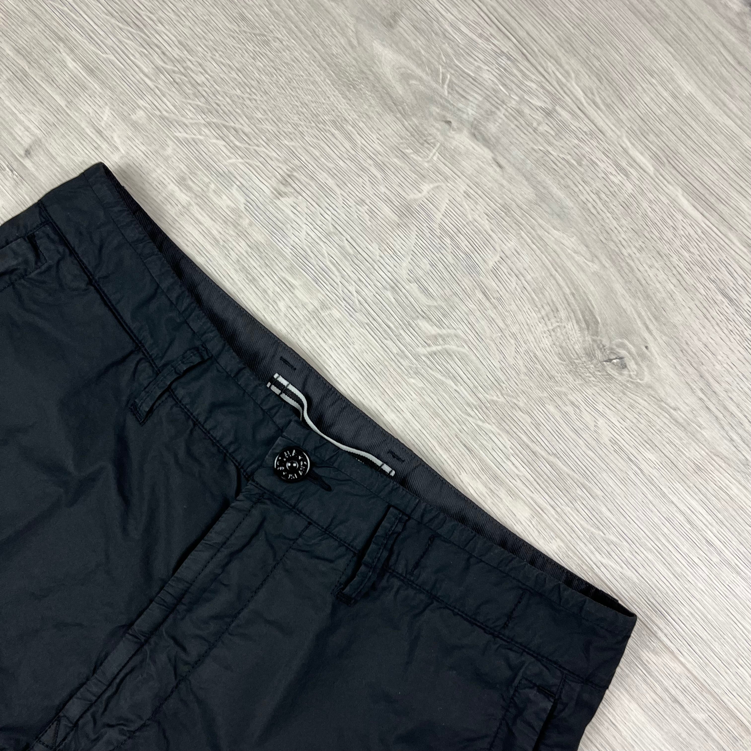 Stone Island Bermuda Cargo Shorts in Black. On sale at Open Attire.