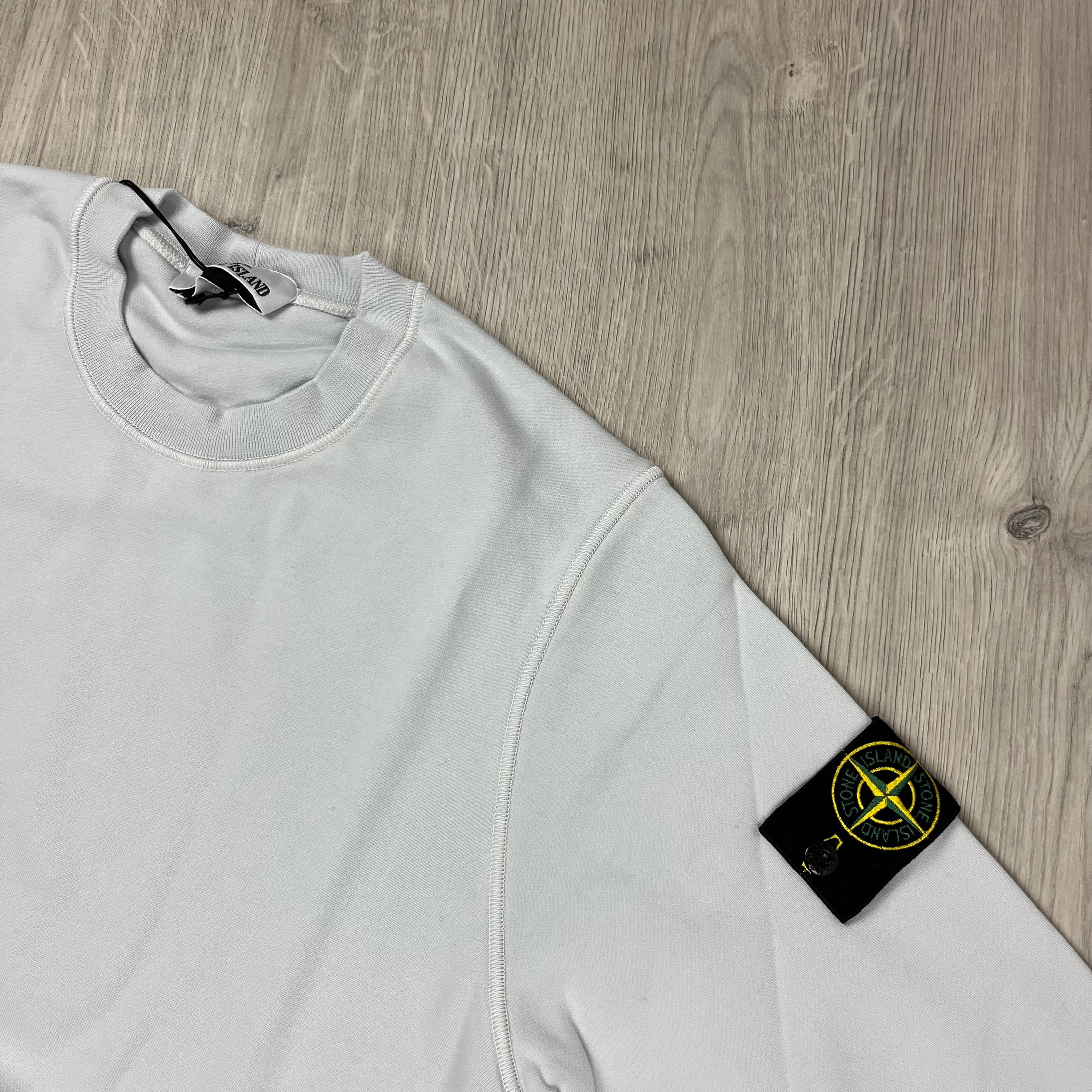 Stone Island Dyed Cotton Sweatshirt in Sky Blue. On sale at Open Attire.