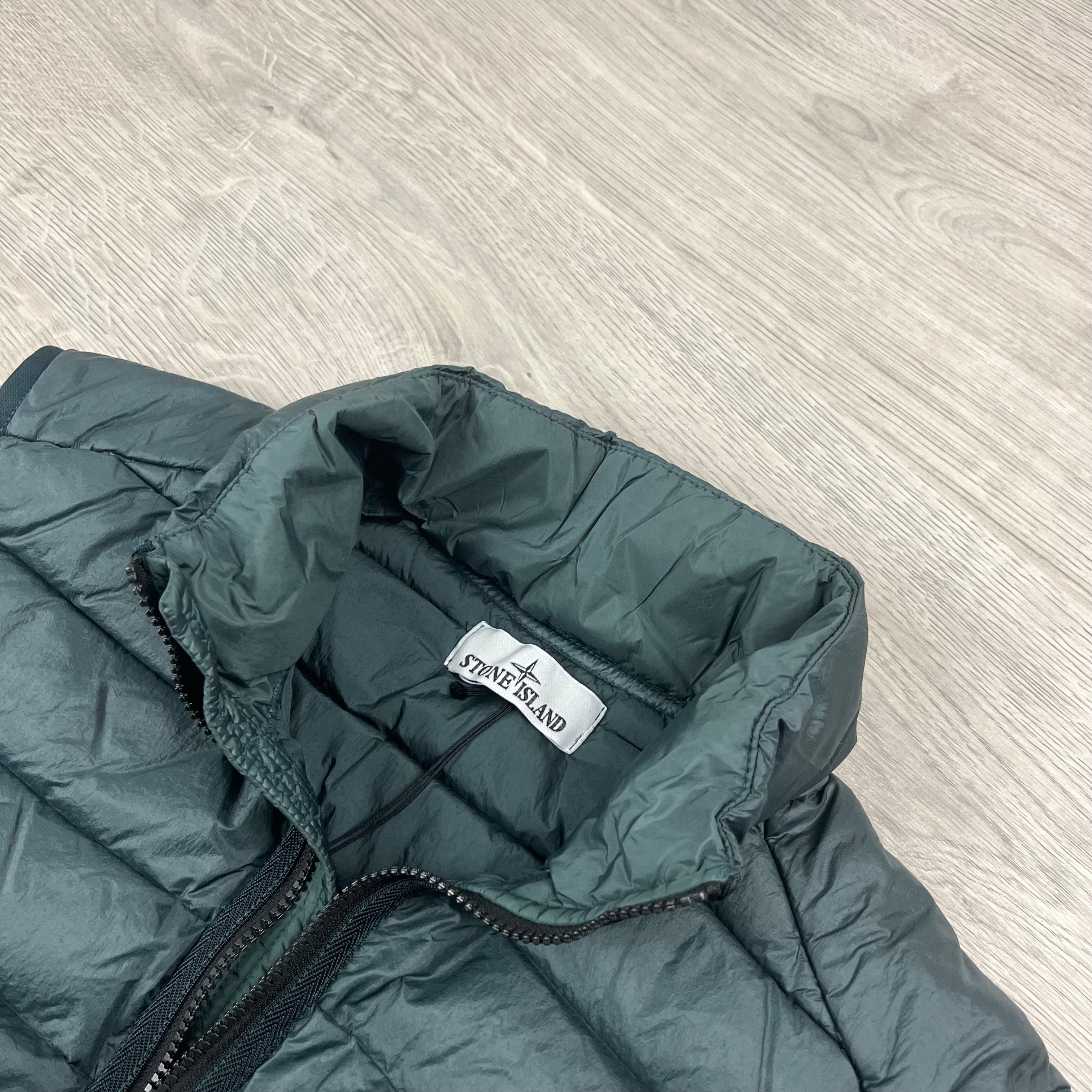 Stone Island Loom Woven Down Gilet in Bottle Green. On sale at Open Attire.