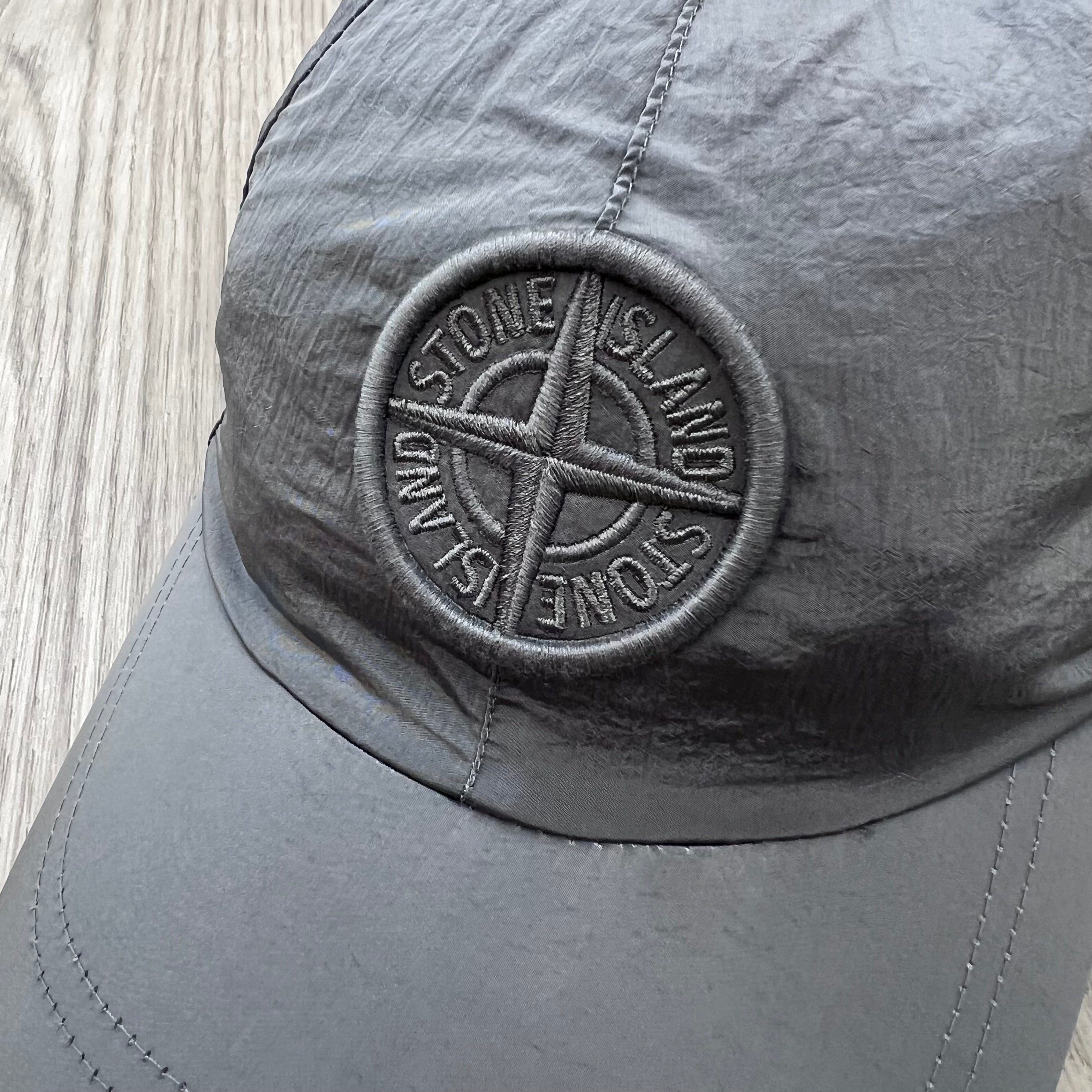 Close up view of the Stone Island Nylon Metal Baseball Cap in Ash Grey.