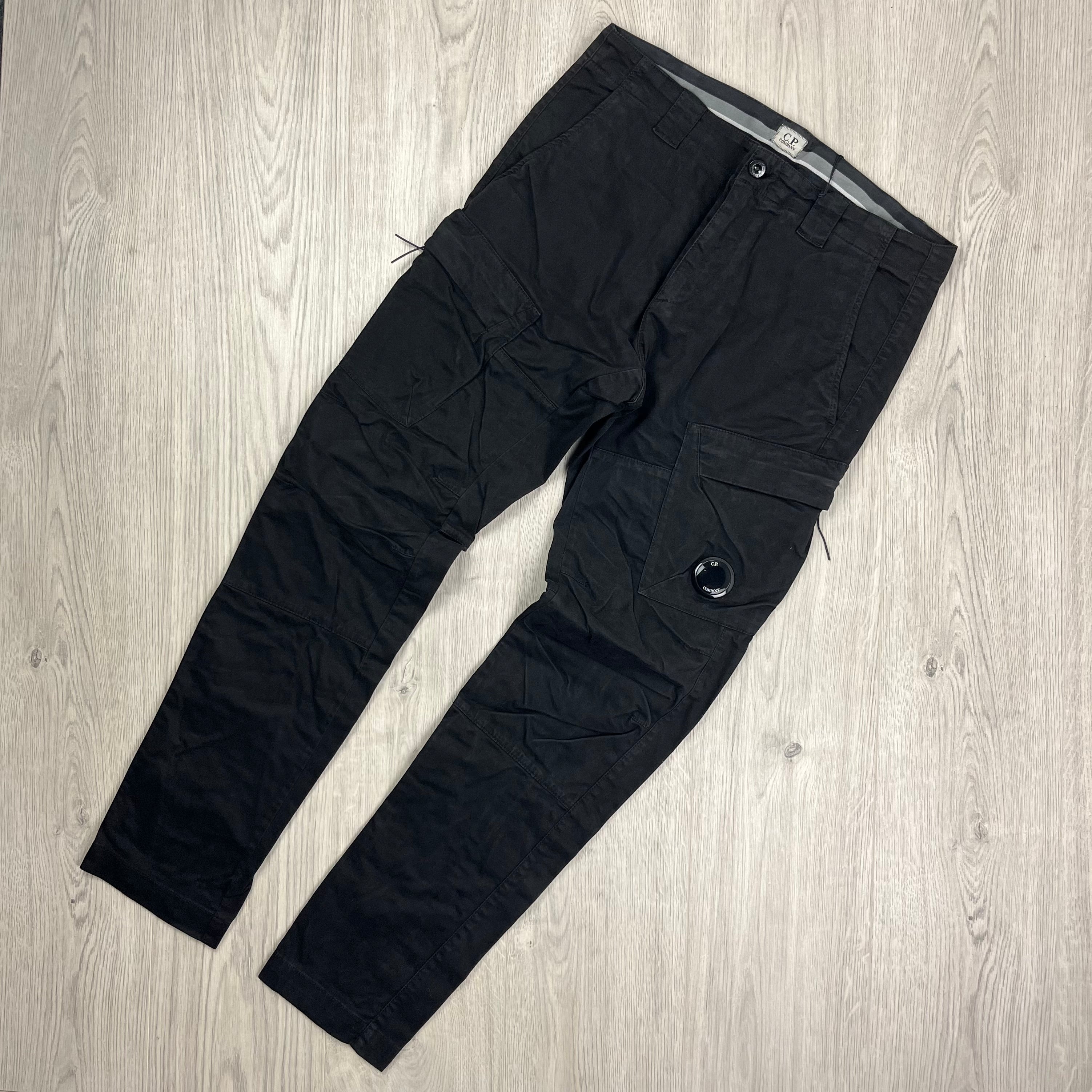 CP Company Stretch Sateen Ergonomic Lens Cargo Pants in Black. On sale at Open Attire.