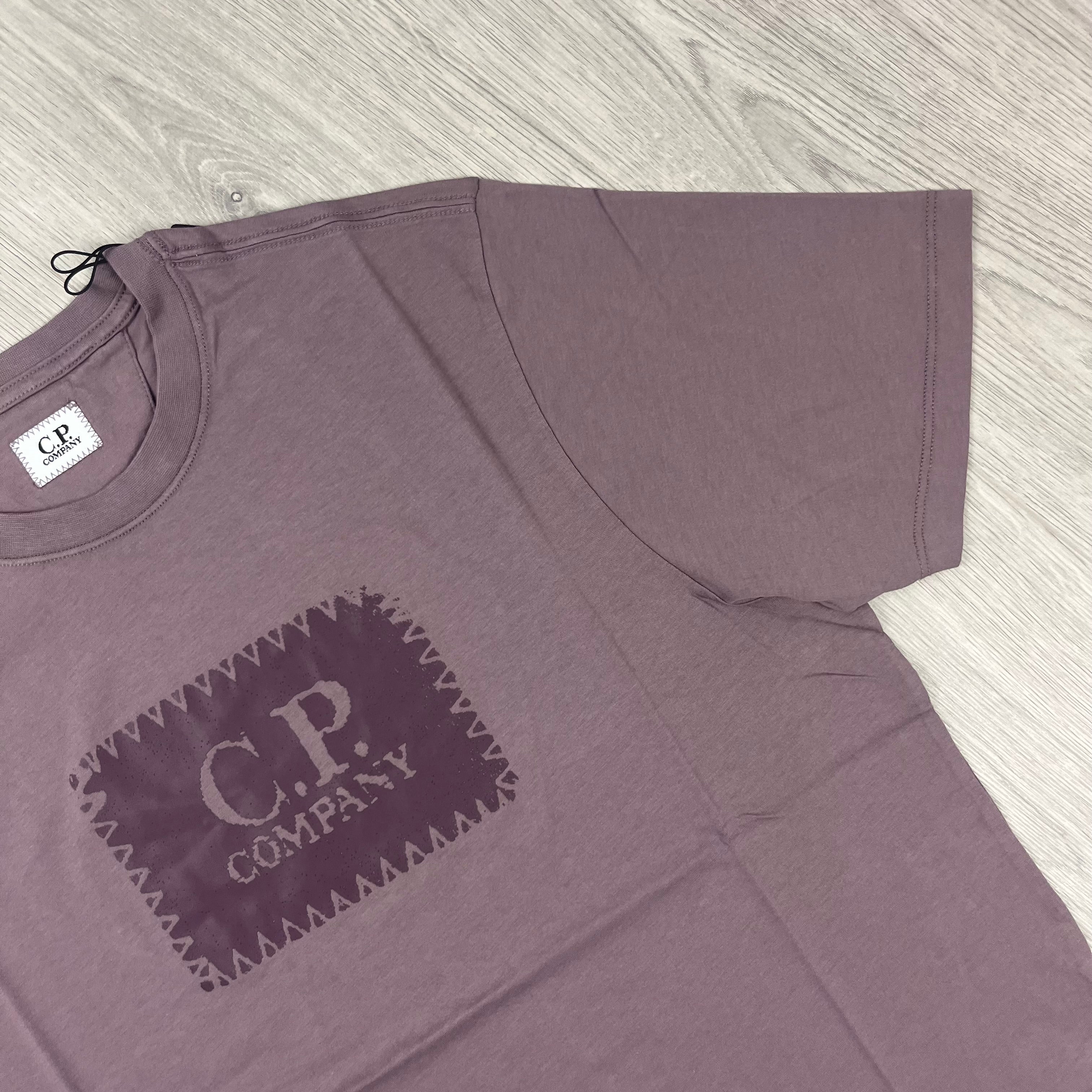 CP Company Stamp Logo T-shirt in Purple Dove. On sale at Open Attire.