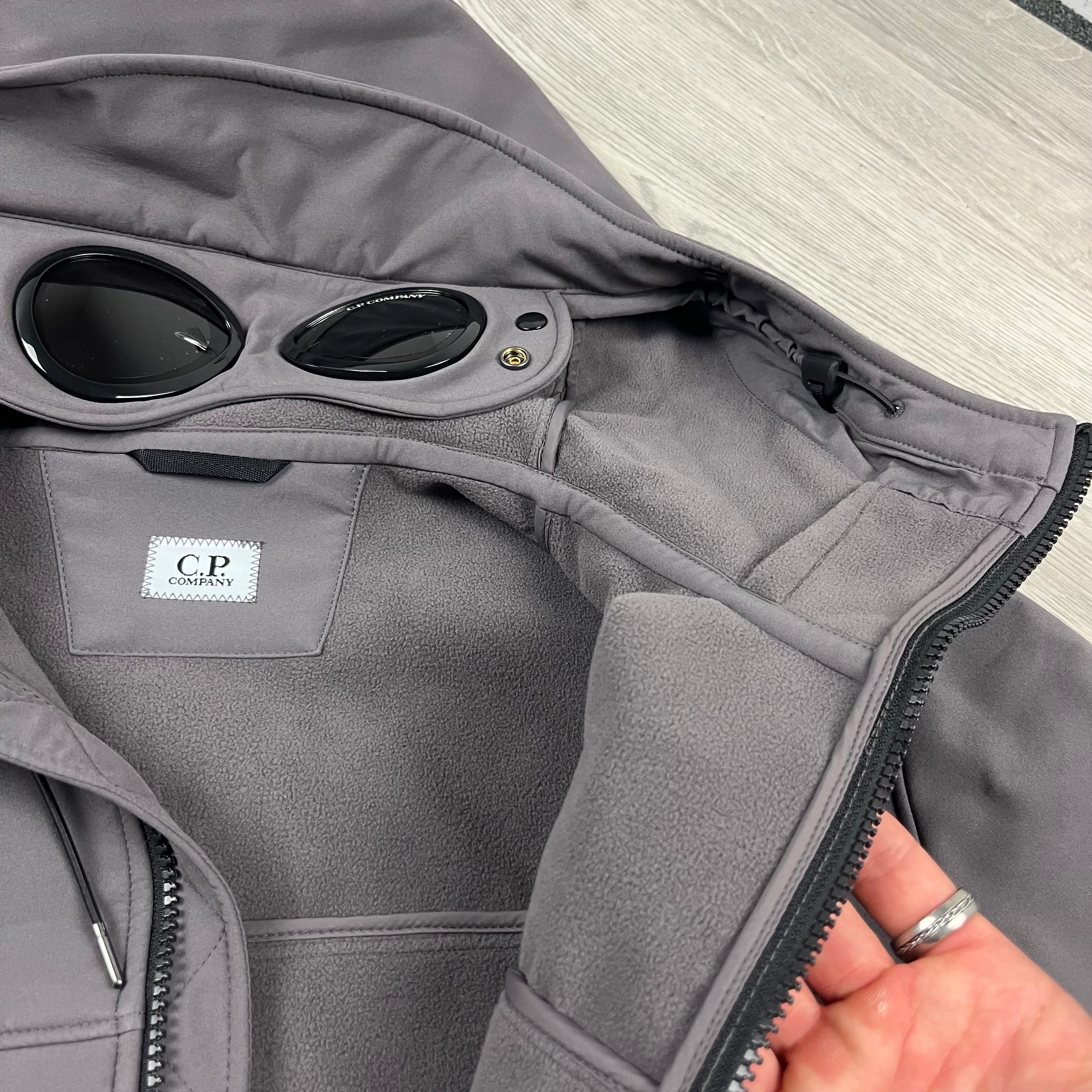 CP Company Shell-R Goggle Jacket in Boulevard Grey. On sale at Open Attire.