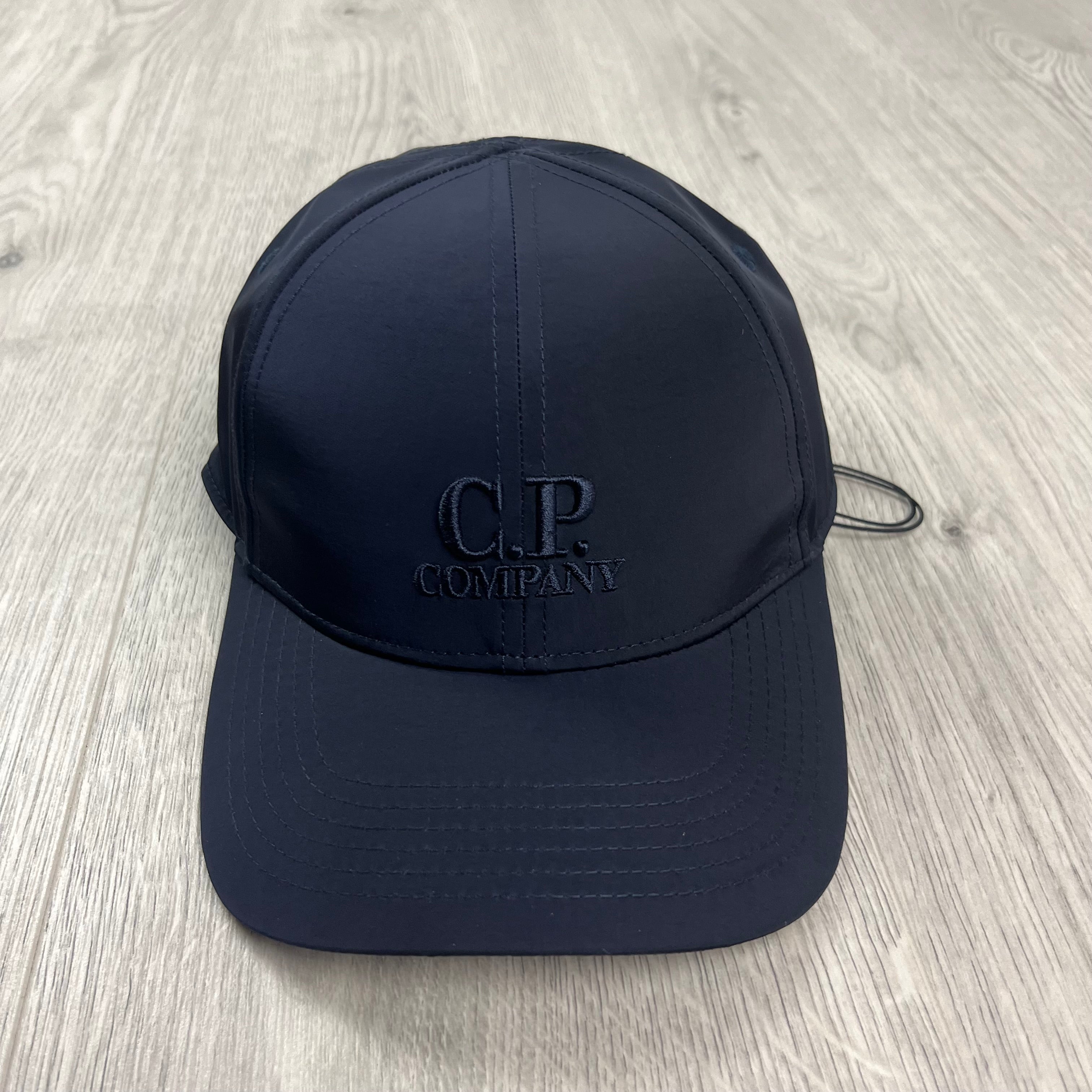 CP Company Chrome-R Baseball Cap in Total Eclipse Navy Blue. On sale at Open Attire.