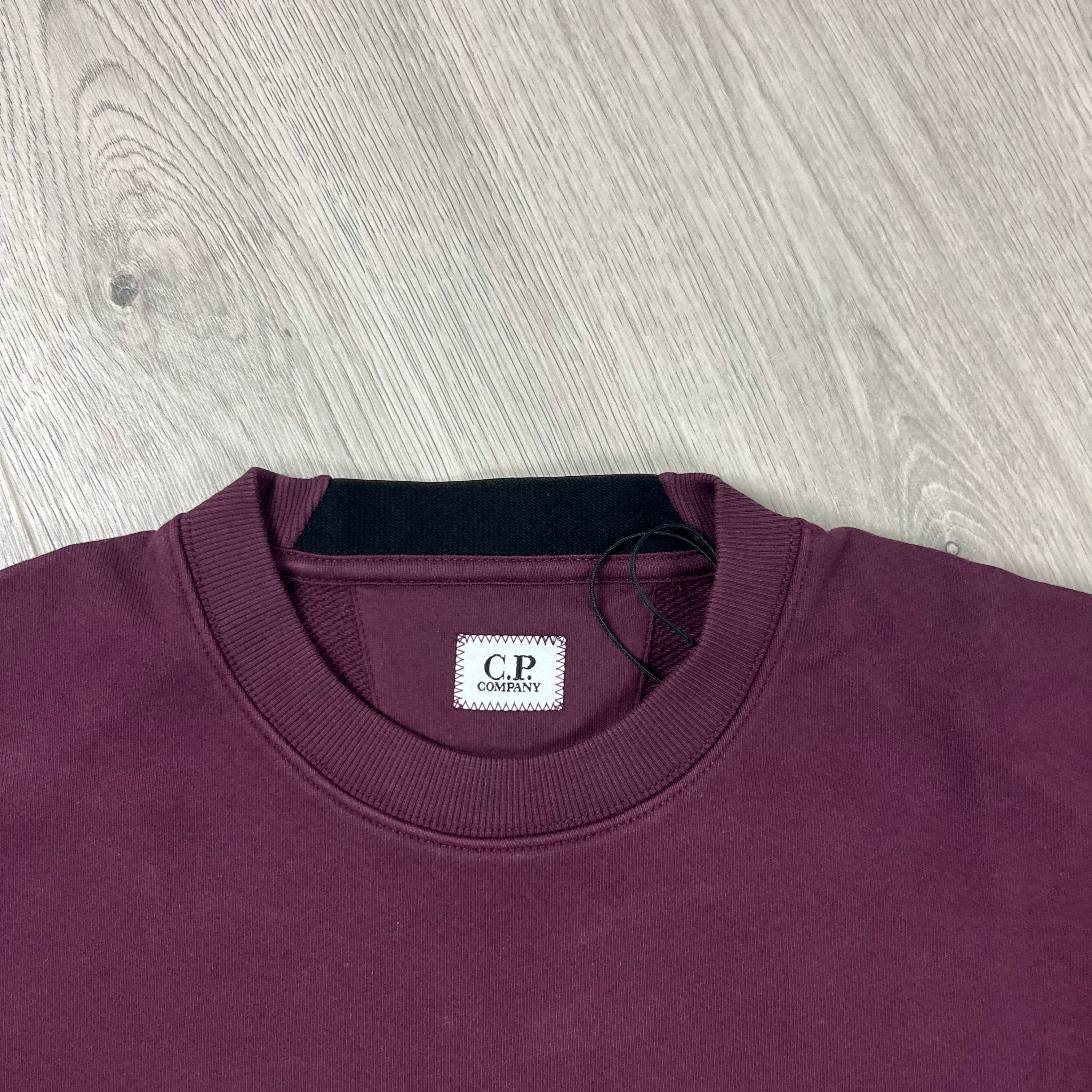 CP Company Raised Fleece Sweatshirt in Potent Purple. On sale at Open Attire. 