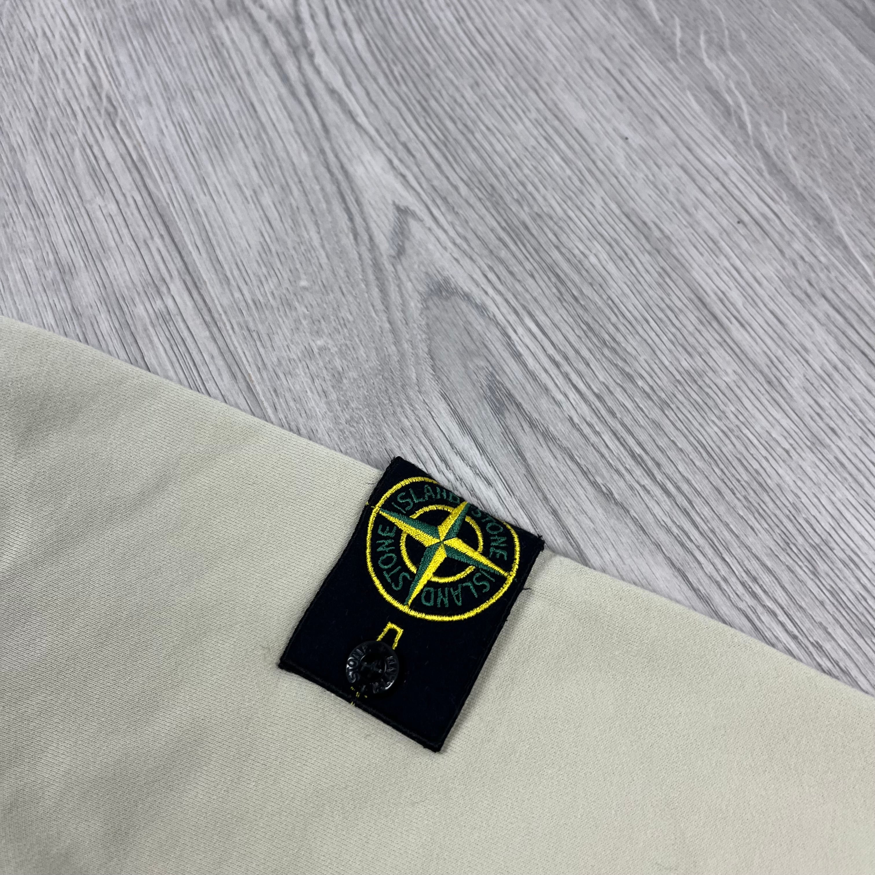 Stone Island Pullover Hoodie in Off White. On sale at Open Attire.