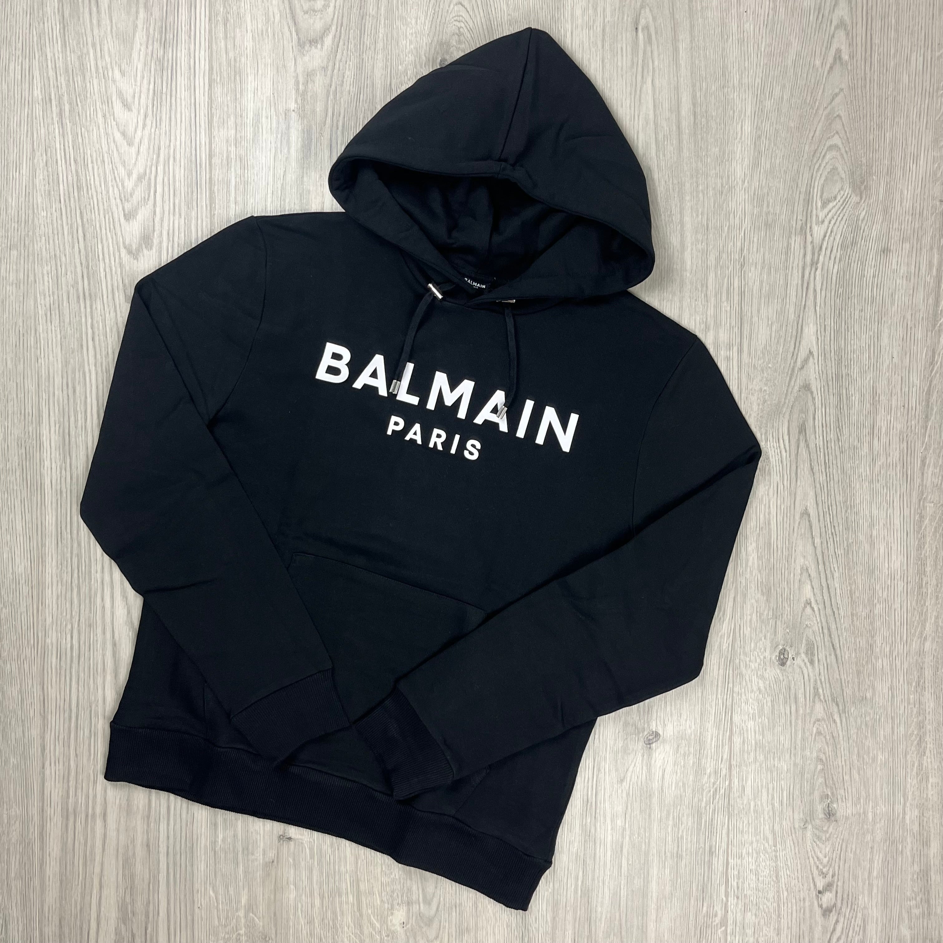 Balmain Printed Hoodie in Black. On sale at Open Attire.