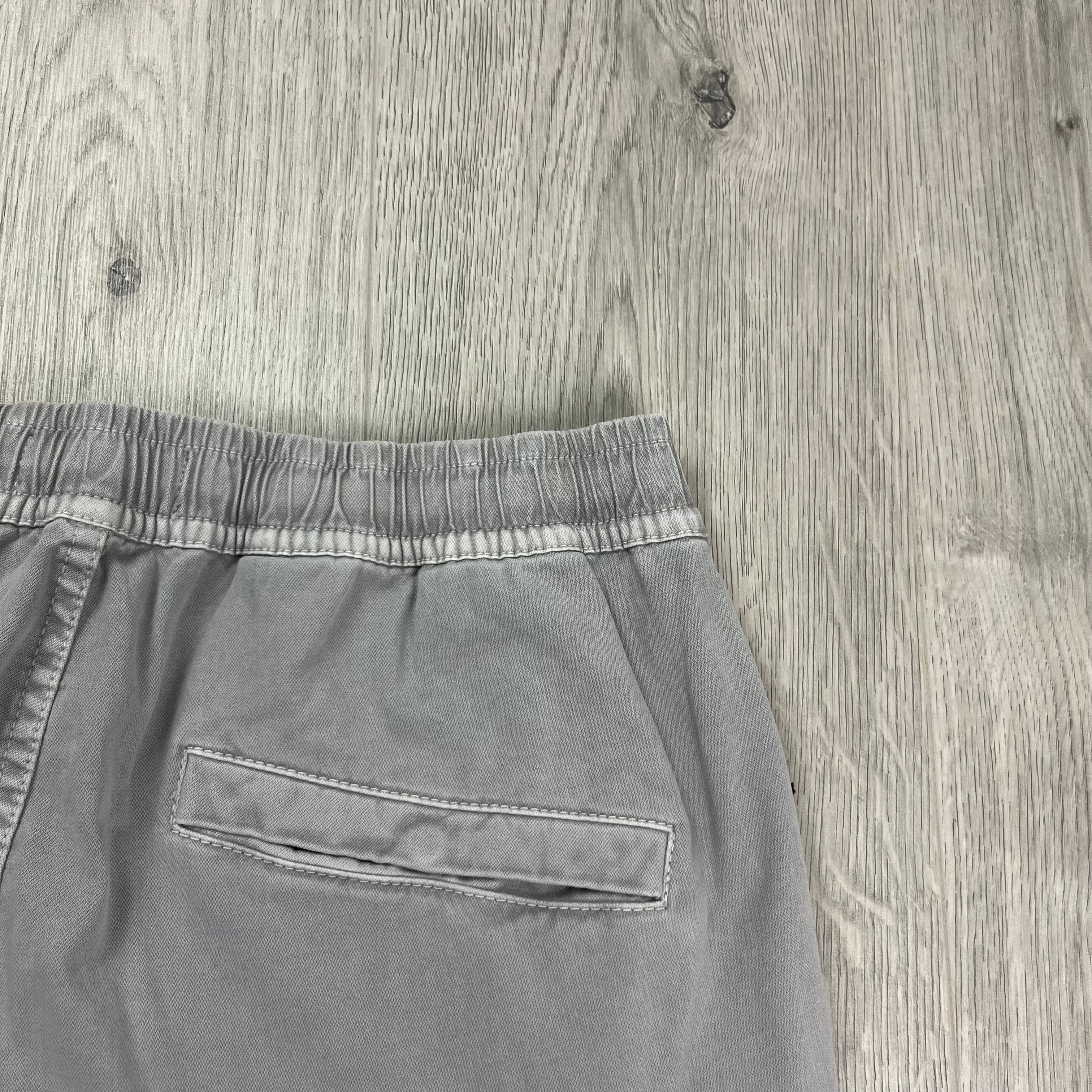 Stone Island Regular Tapered Fit Cargo Pants in Grey. On sale at Open Attire.