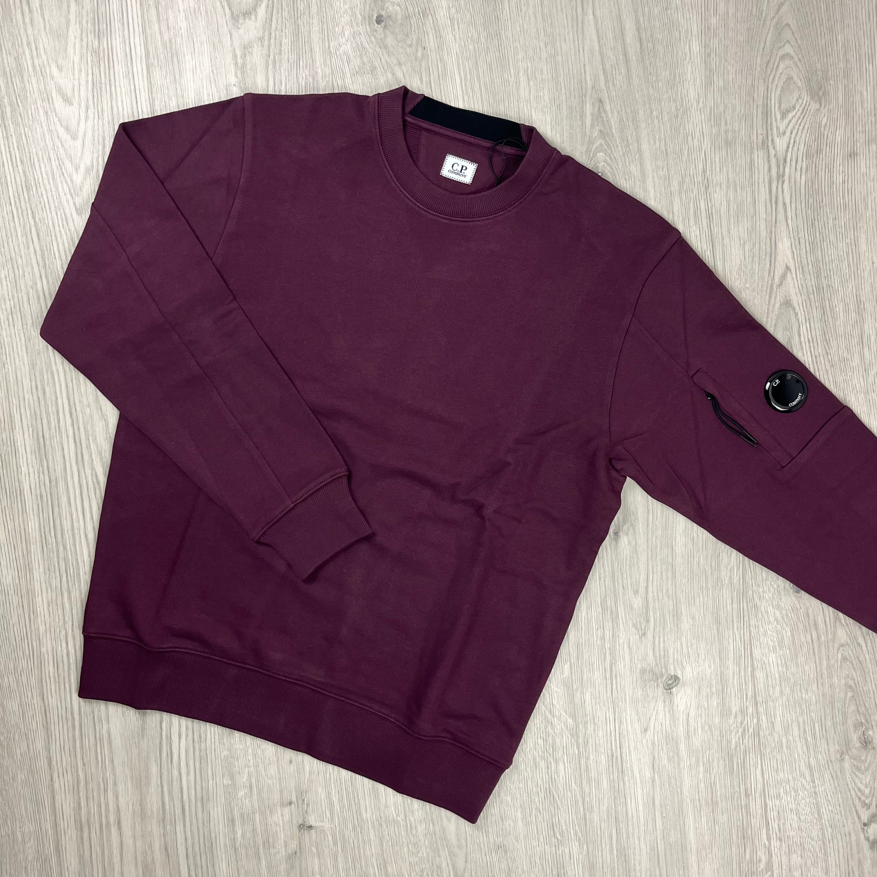 CP Company Raised Fleece Sweatshirt in Potent Purple. On sale at Open Attire. 
