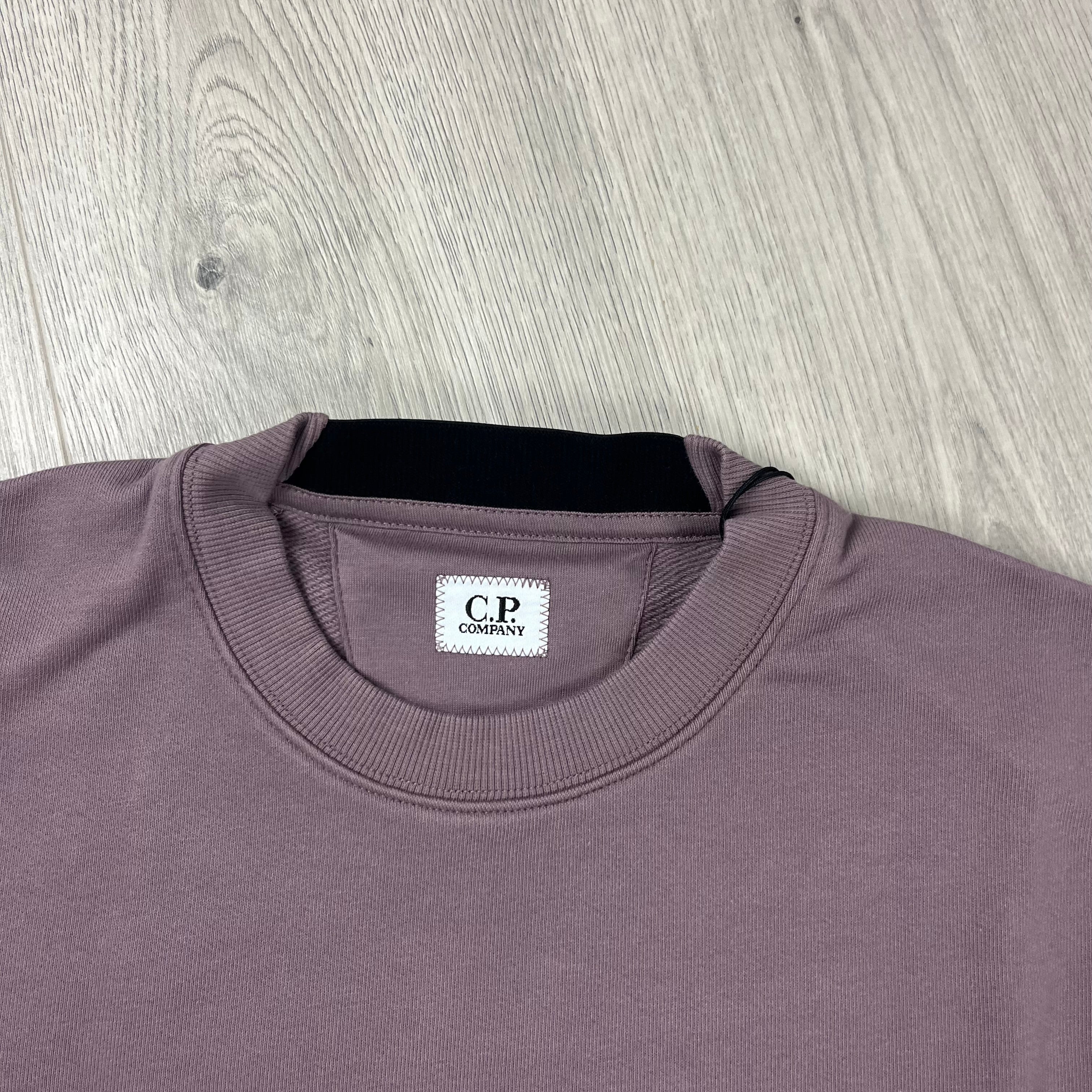 CP Company Raised Fleece Sweatshirt in Purple Dove. On sale at Open Attire. 
