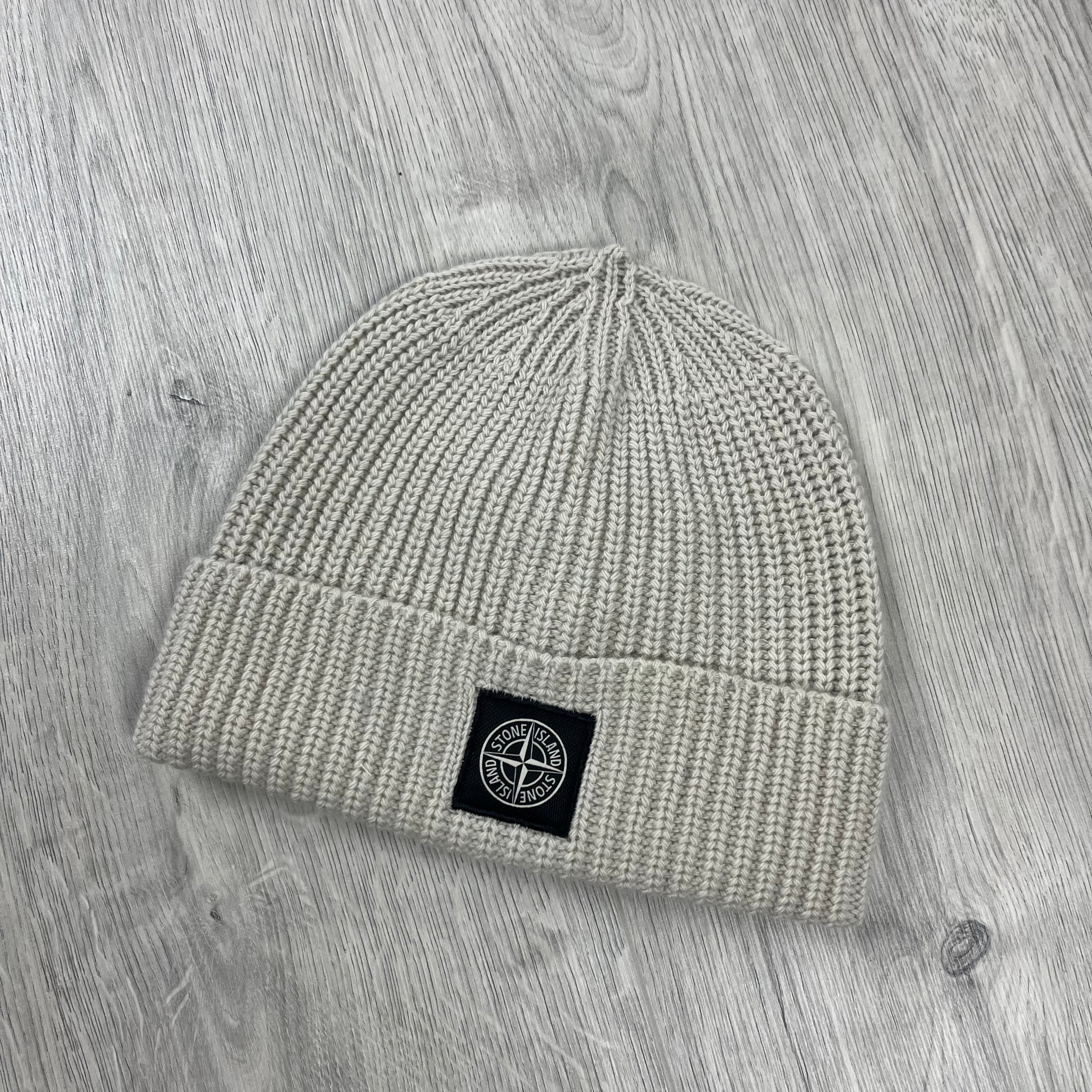 Stone Island wool beanie in Plaster. On sale at Open Attire.