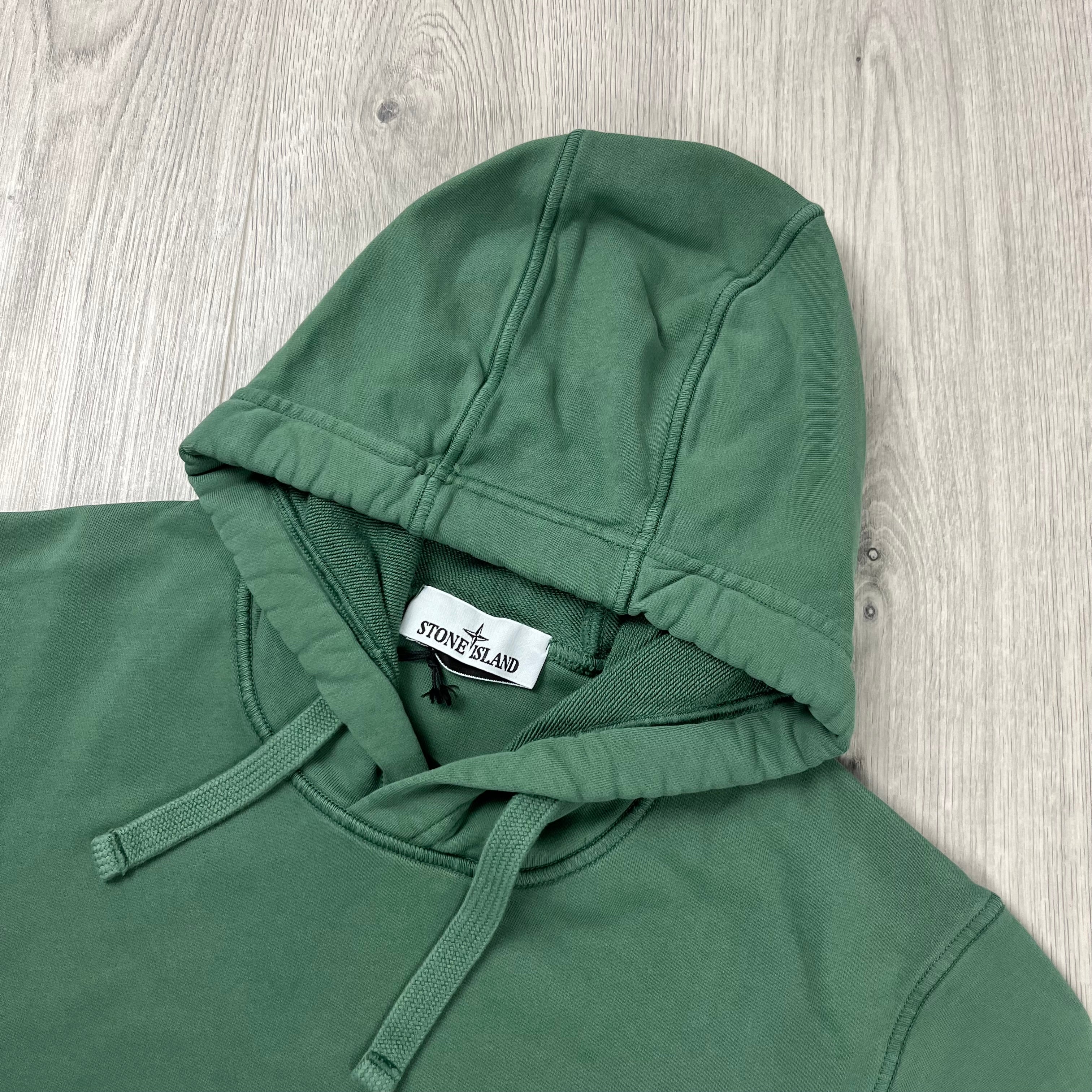 Stone Island Pullover Hoodie in Sage Green. On sale at Open Attire.