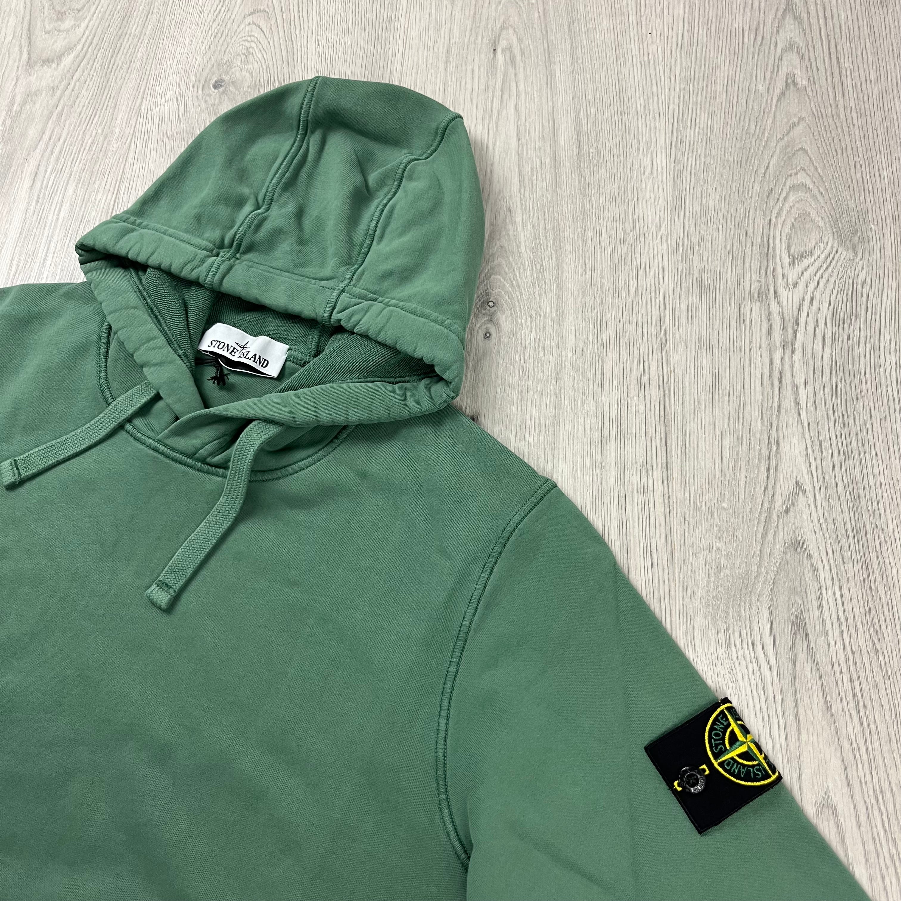 Stone Island Pullover Hoodie in Sage Green. On sale at Open Attire.