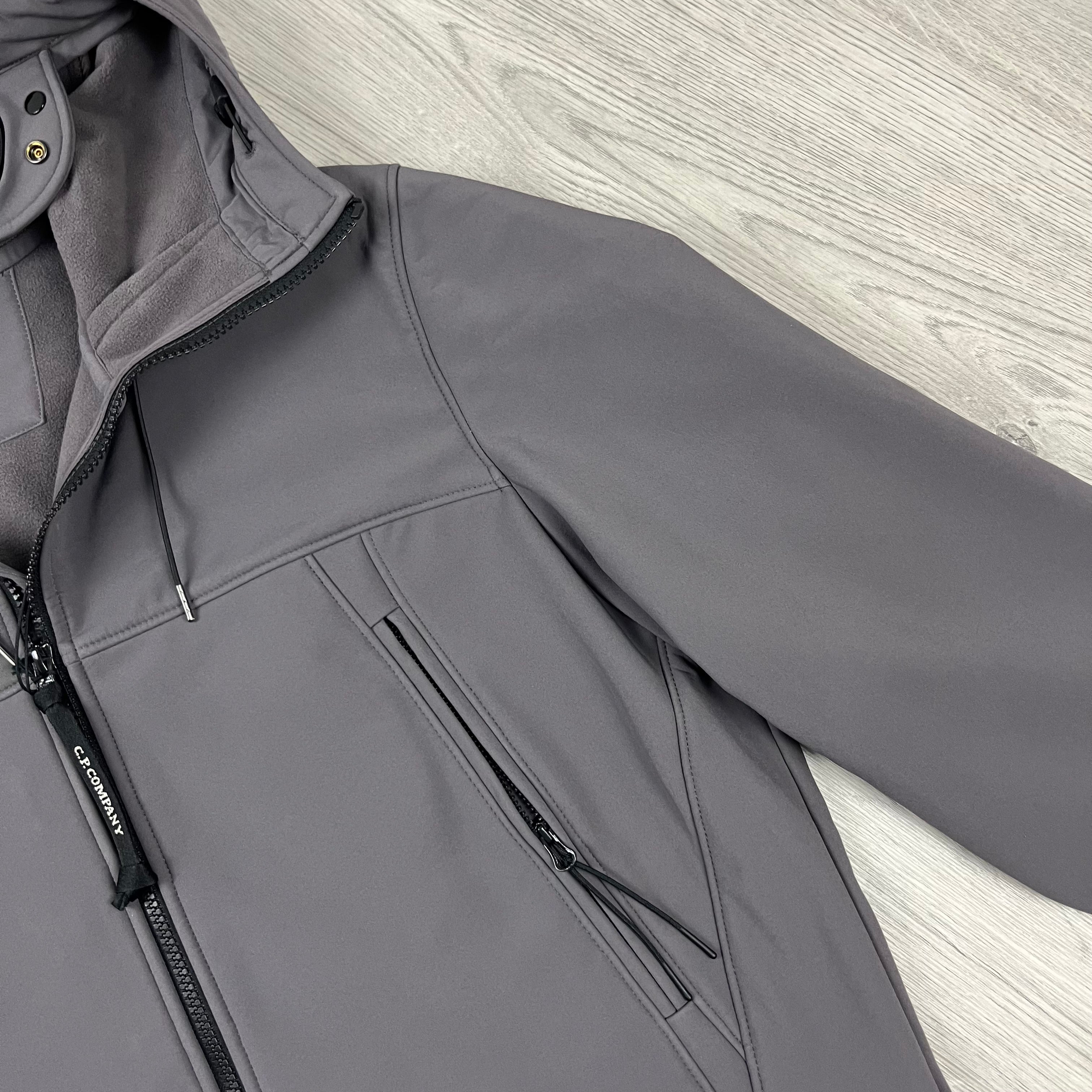 CP Company Shell-R Goggle Jacket in Boulevard Grey. On sale at Open Attire.