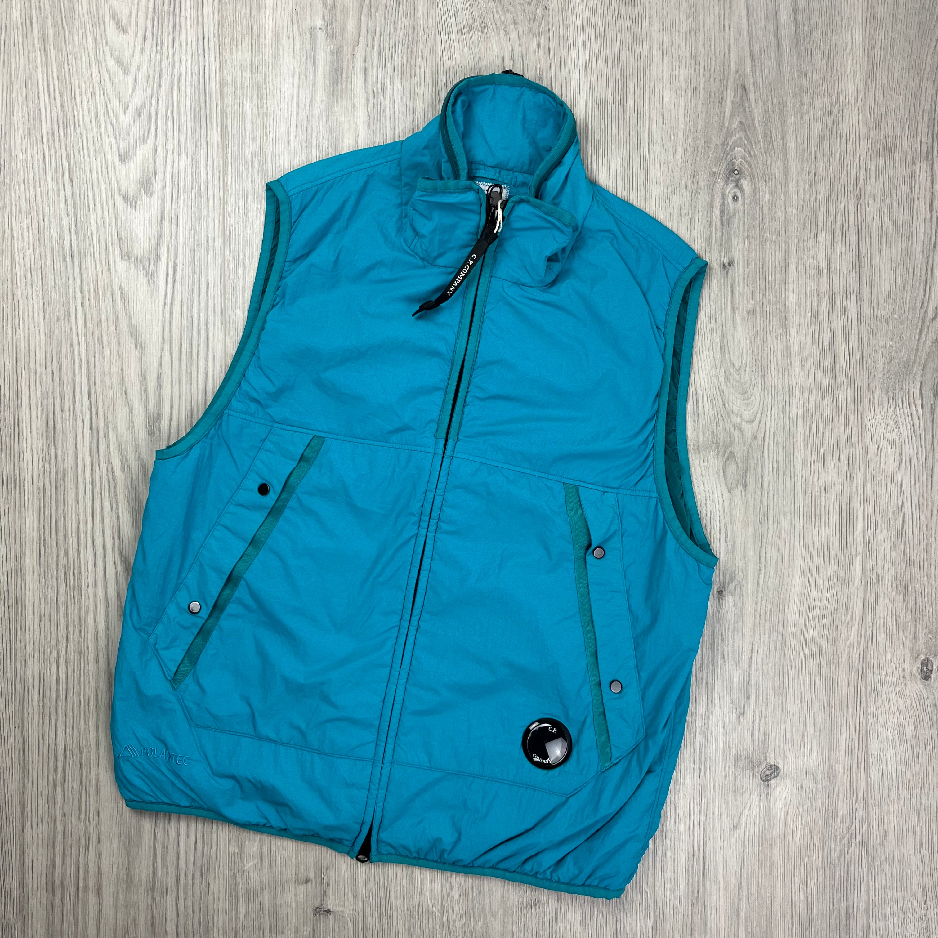 CP Company G.D.P. gilet in Tile Blue. On sale at Open Attire.