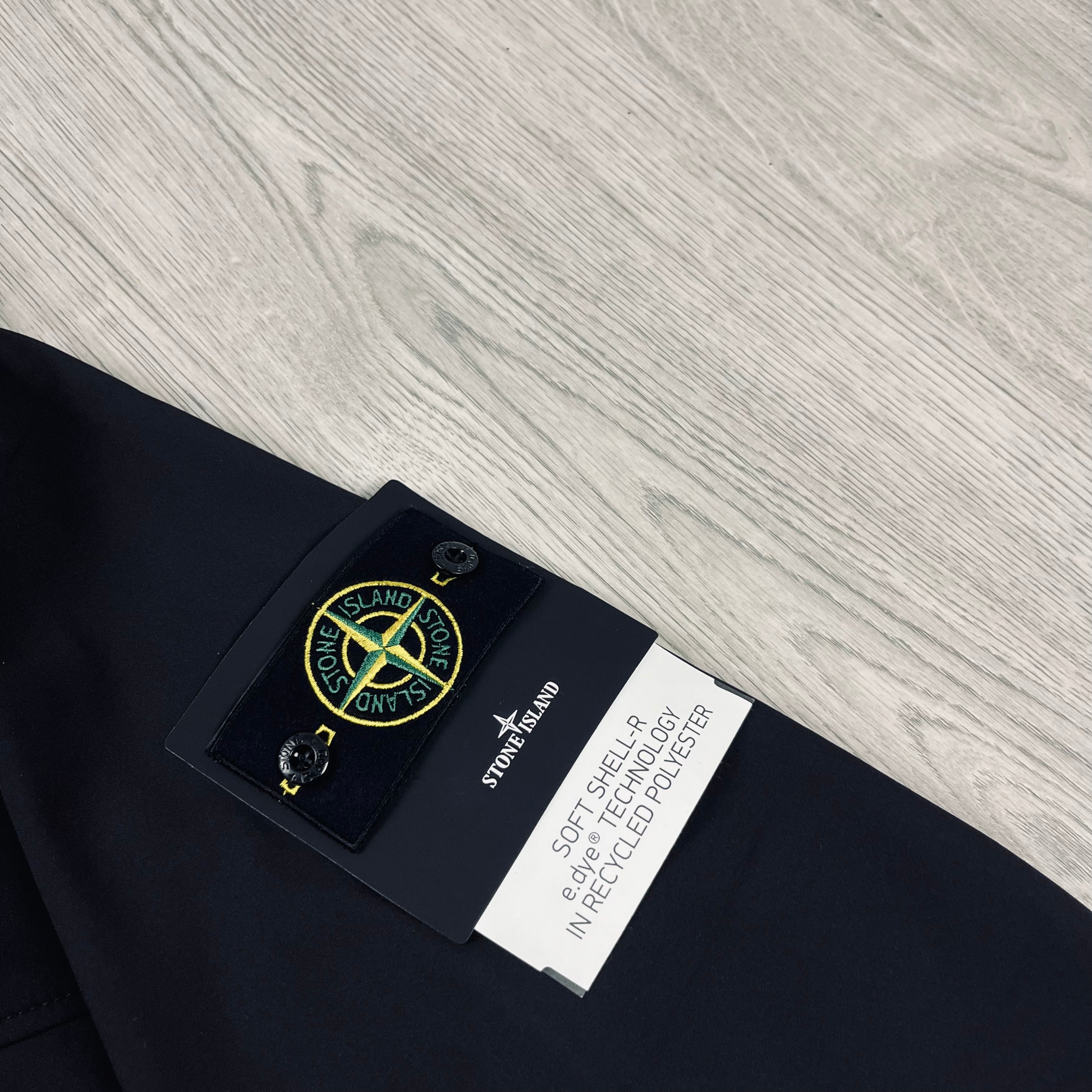 Stone Island Soft Shell-R Jacket in Black. On sale at Open Attire.