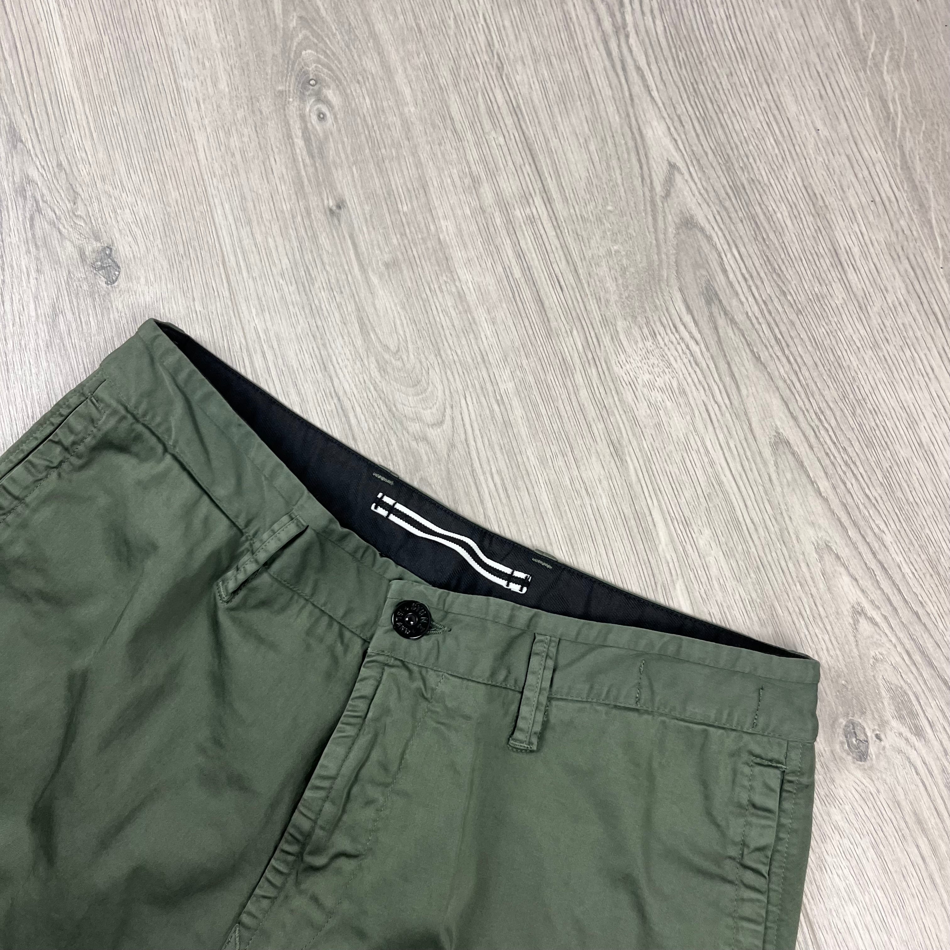 Stone Island Cotton Satin Cargo Trousers in Musk Green. On sale at Open Attire.