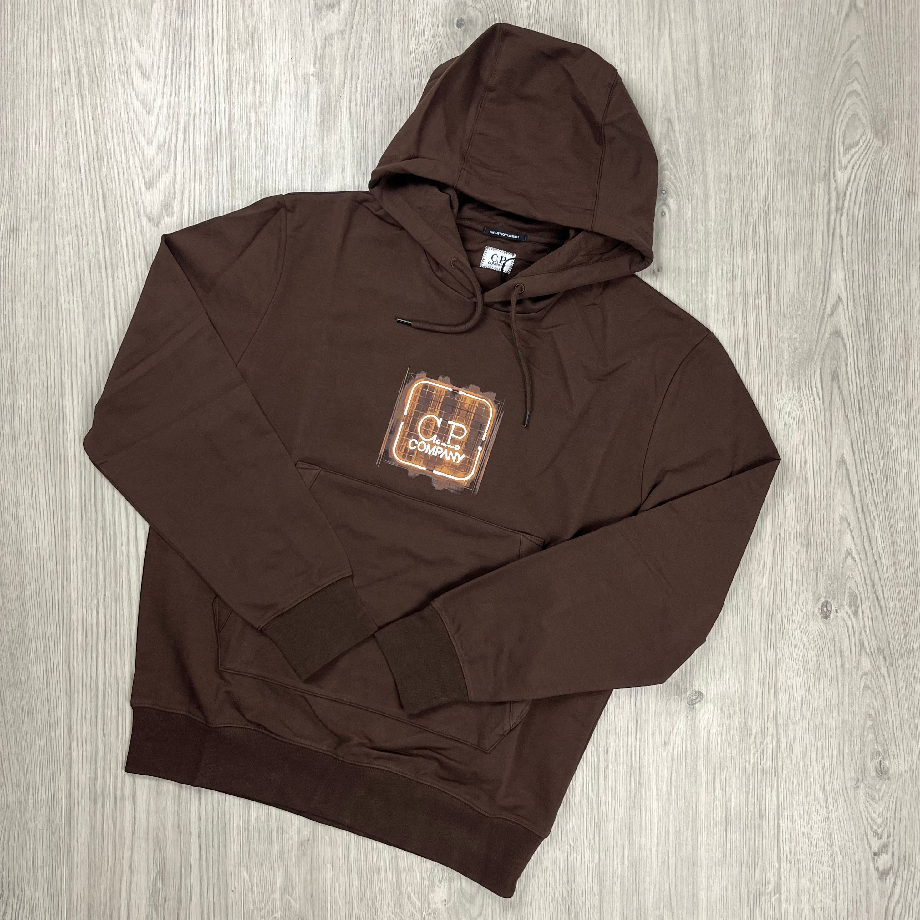 CP Company Metropolis Logo Hoodie in Rum Raisin. On sale at Open Attire.