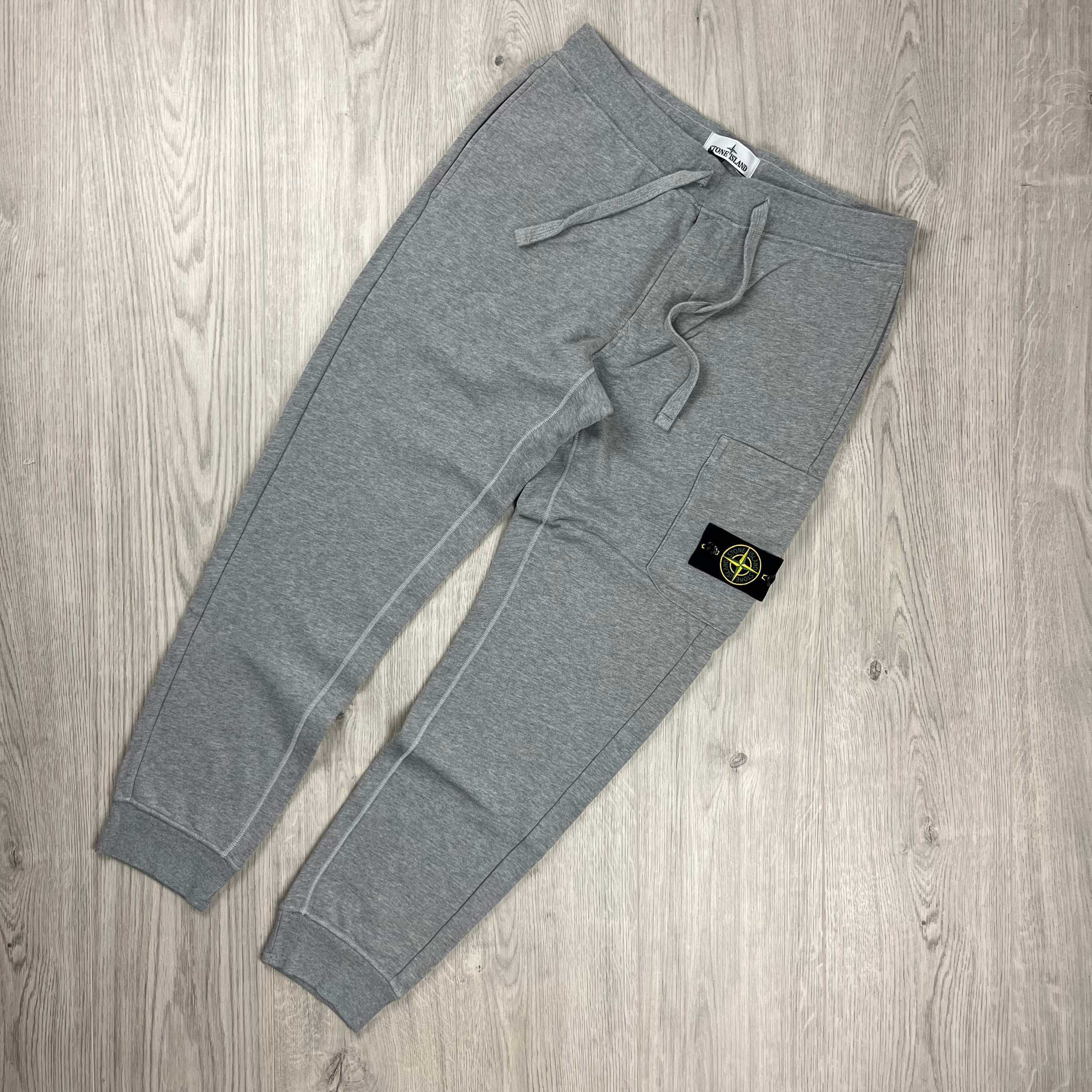 Stone Island Tapered Sweatpants in Dust Grey. On sale at Open Attire.