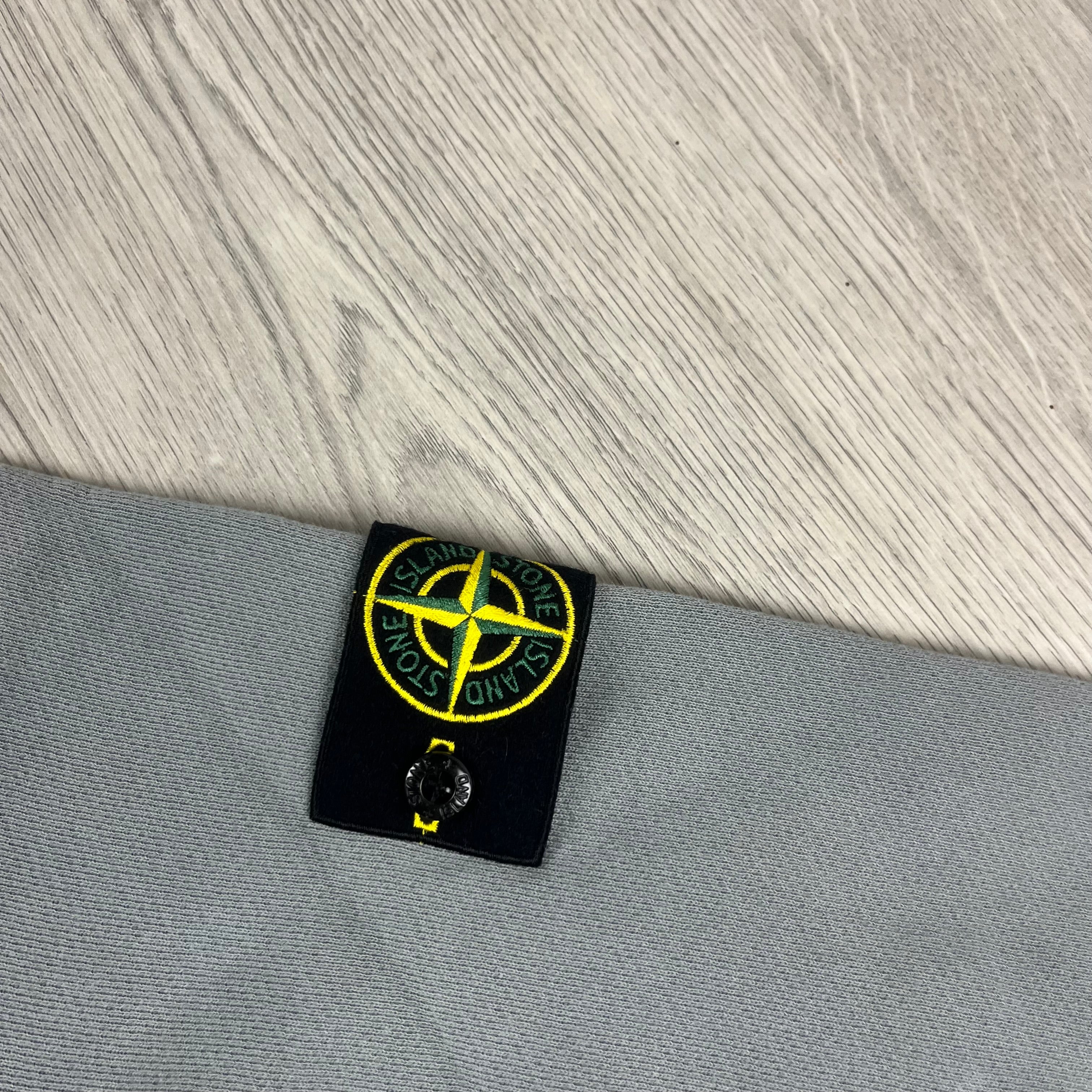 Stone Island crewneck sweatshirt in Green Grey. On sale at Open Attire.