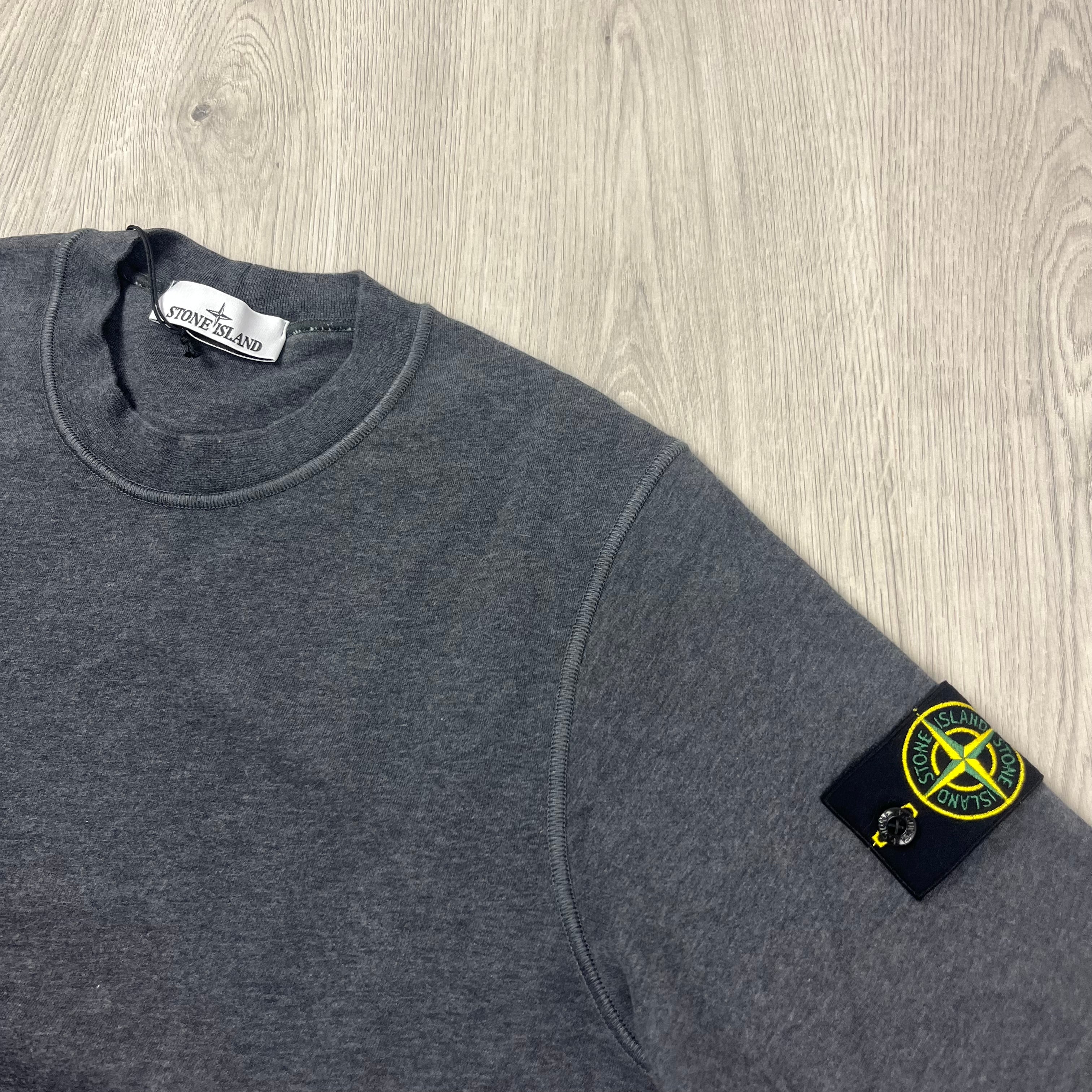 Stone Island crewneck sweatshirt in Dark Grey Melange. On sale at Open Attire. 