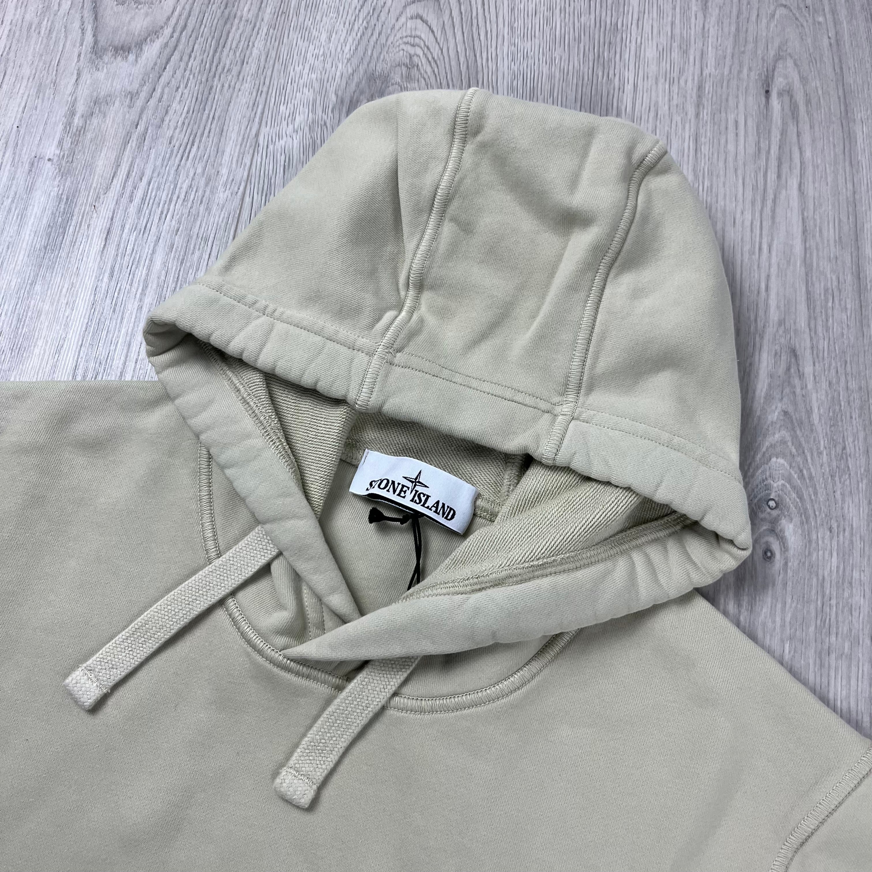 Stone Island Pullover Hoodie in Off White. On sale at Open Attire.