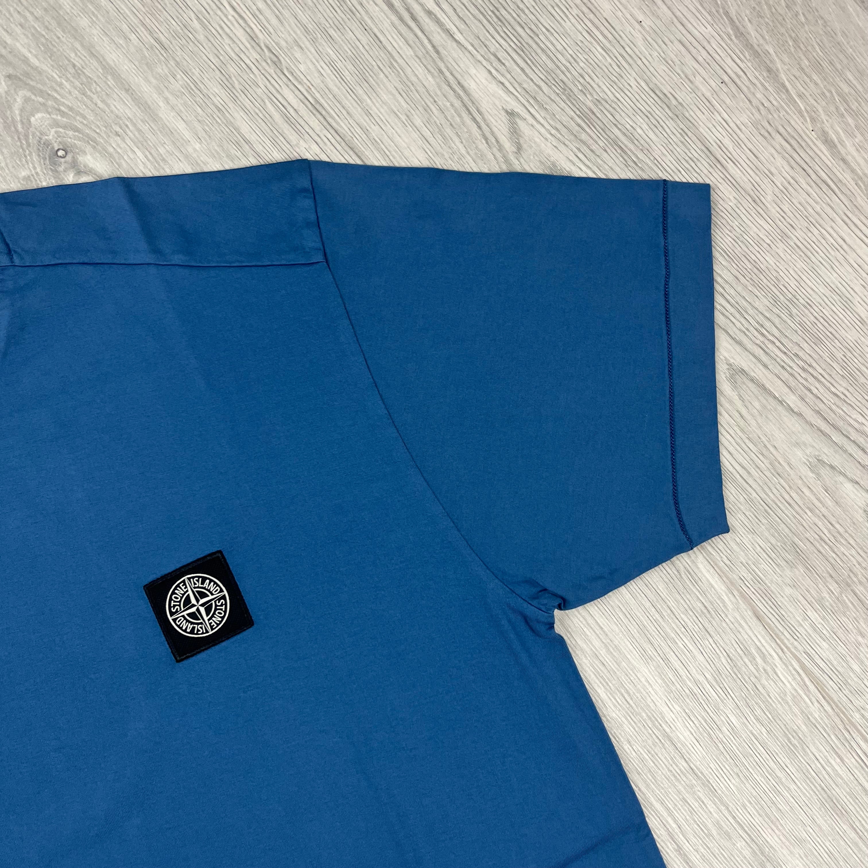 Stone Island Patch T-shirt in Avio Blue. On sale at Open Attire.