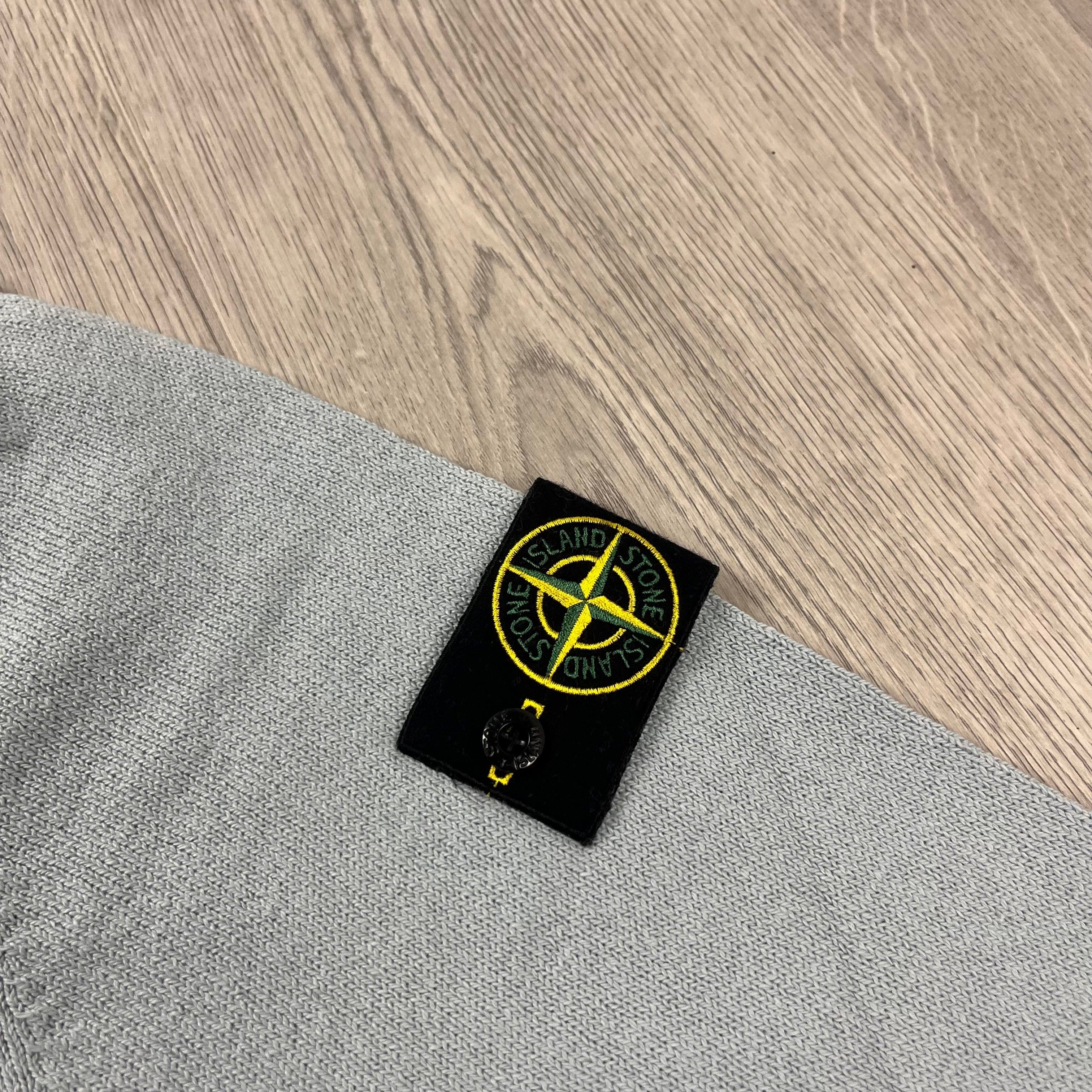 Stone Island knitted sweatshirt in Sky Blue. On sale at Open Attire.