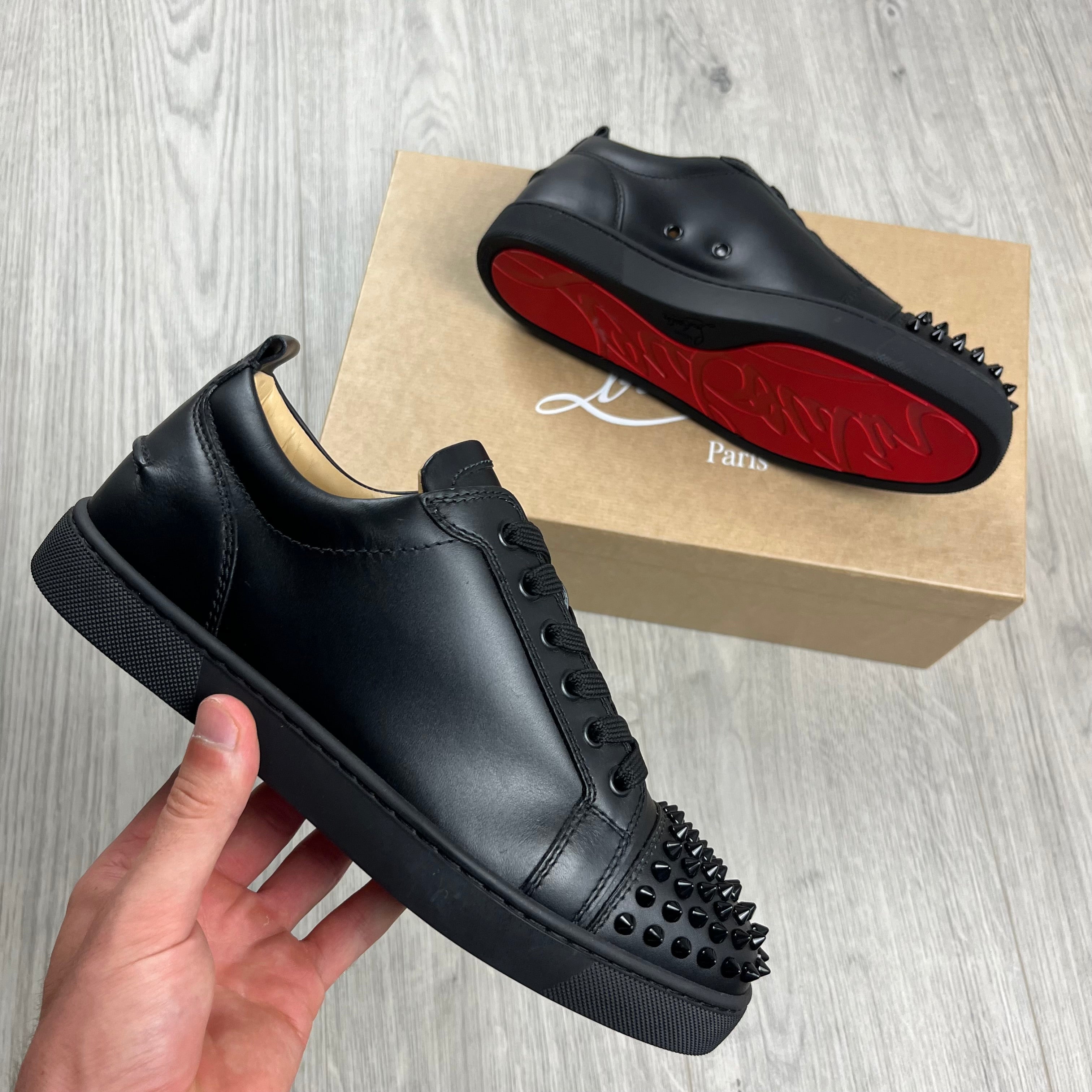 Christian Louboutin Louis Junior Sneakers in Black. On sale at Open Attire.