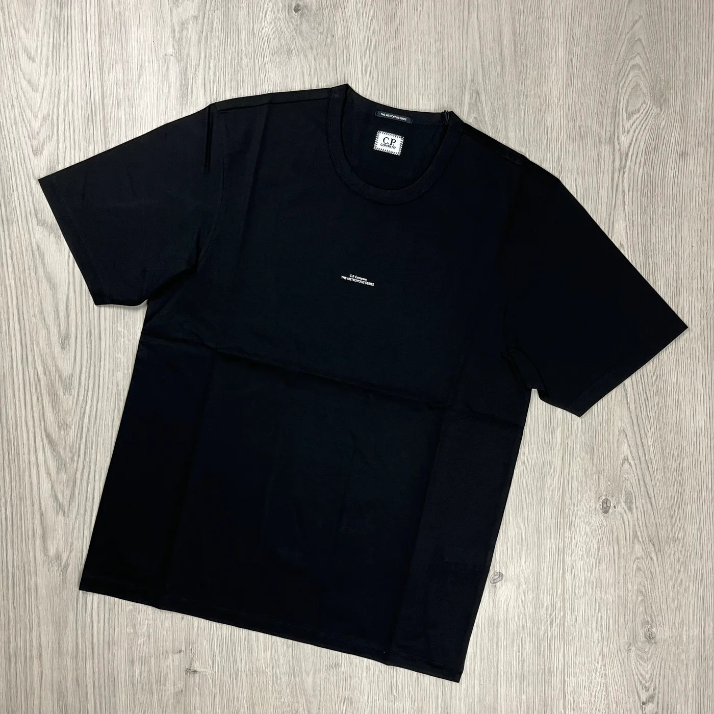 CP Company Metropolis Series T-shirt in a black. On sale at Open Attire.